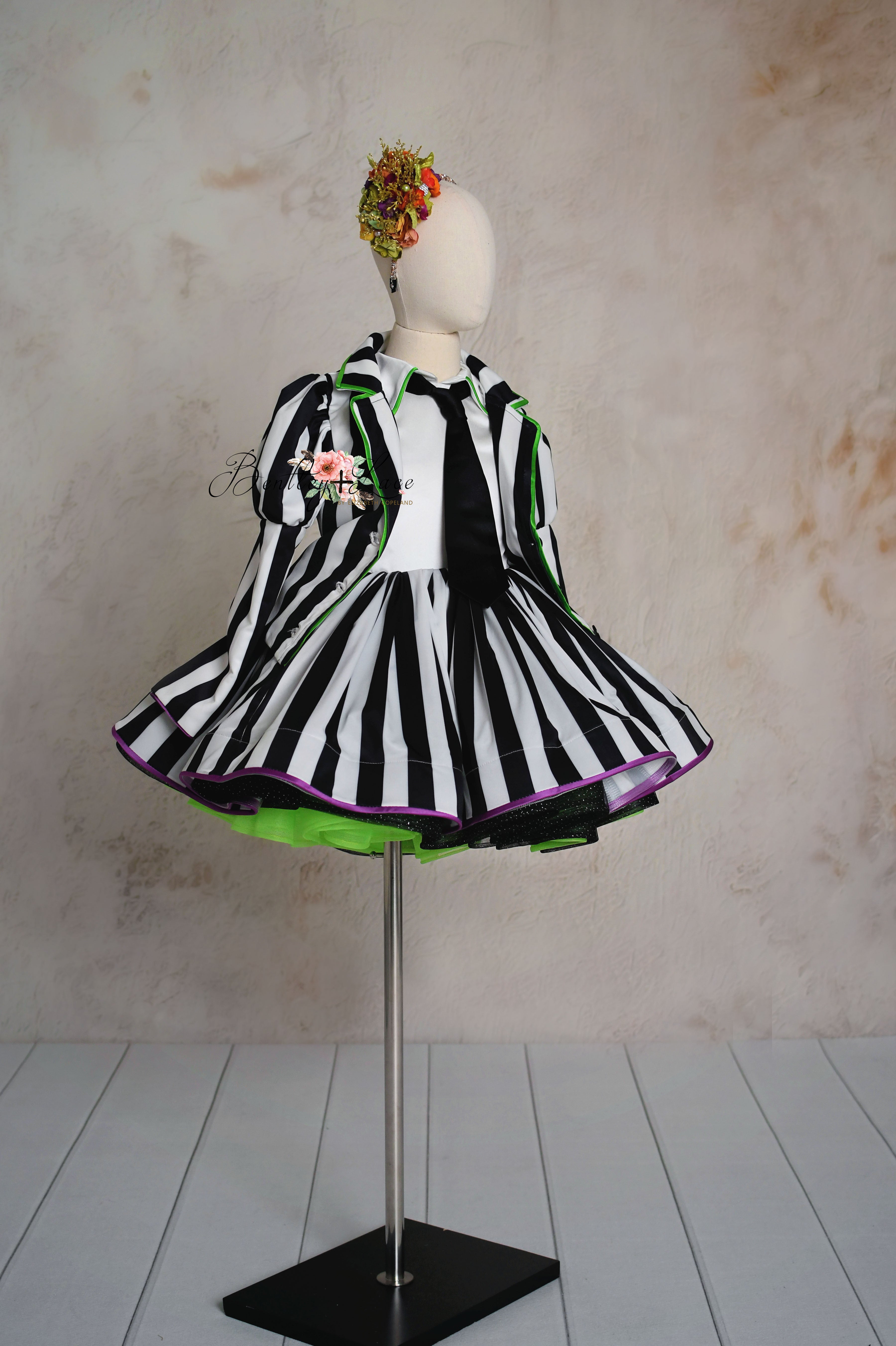 Beetlejuice-inspired striped dress and jacket for girls.
