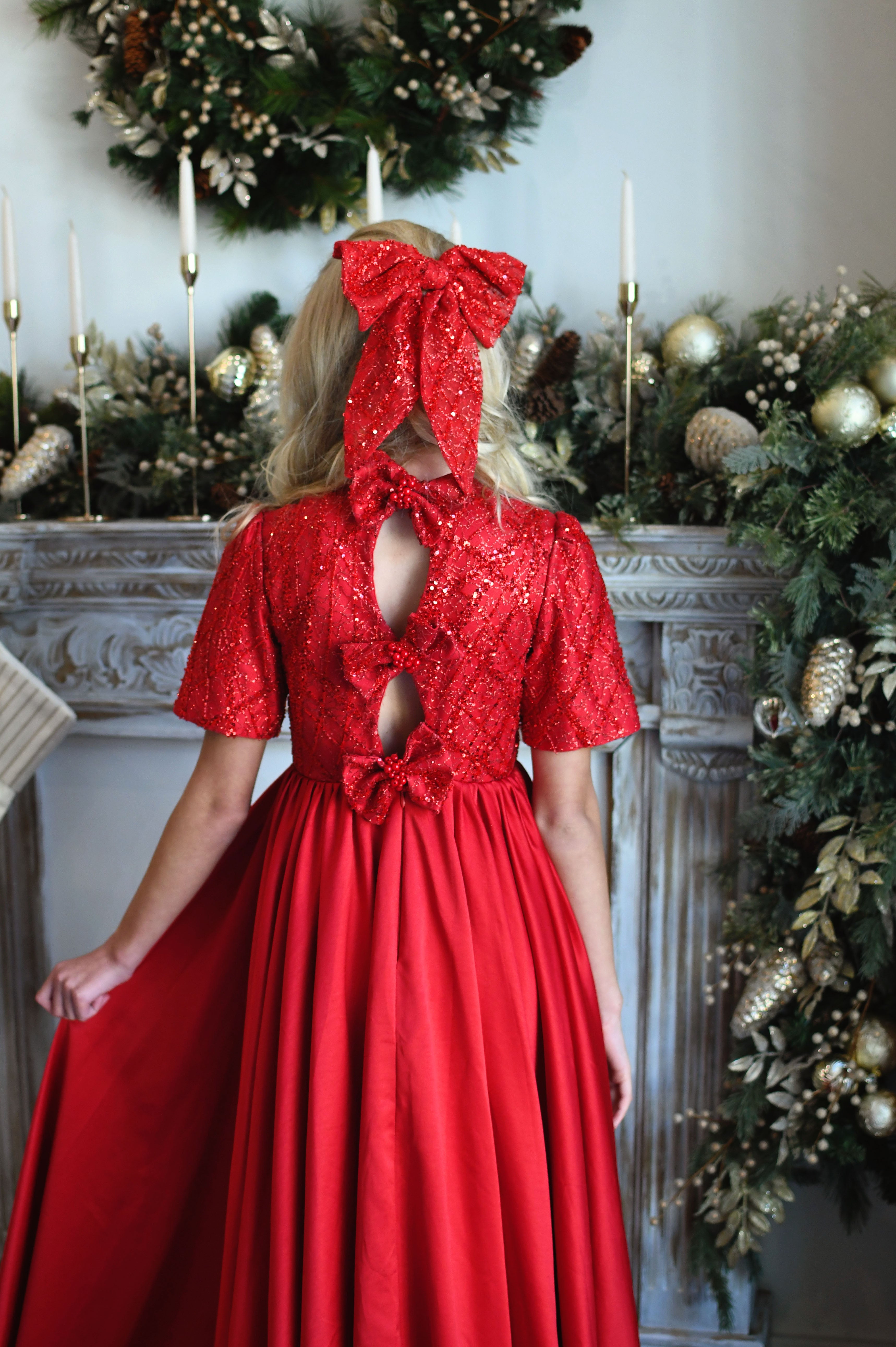 Close-up of sparkling beaded cap sleeves on the Scarlet Sparkle gown