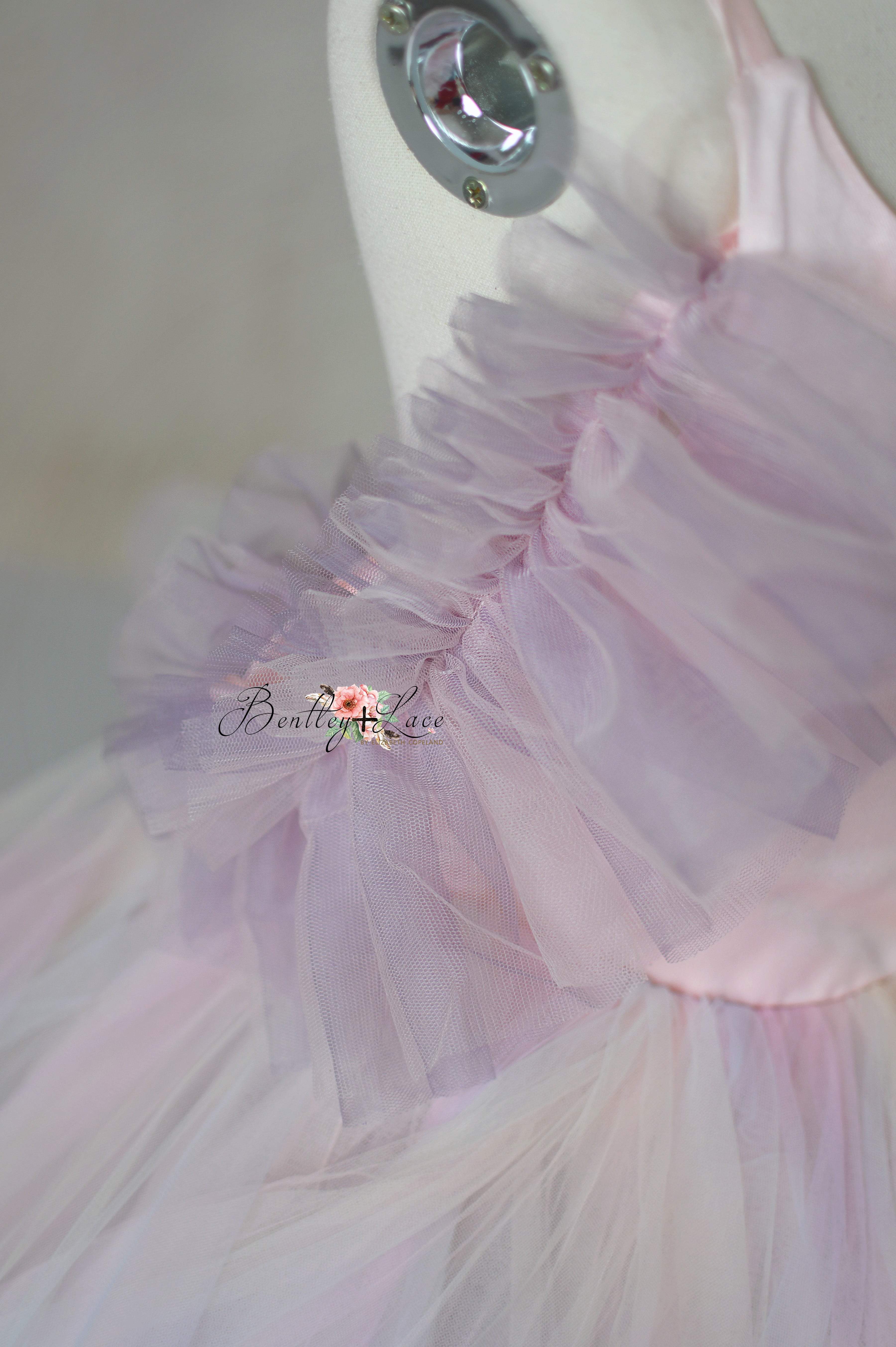 Chasing Rainbows gown with an ethereal pastel palette and detachable tulle sleeves, perfect for weddings and photography.