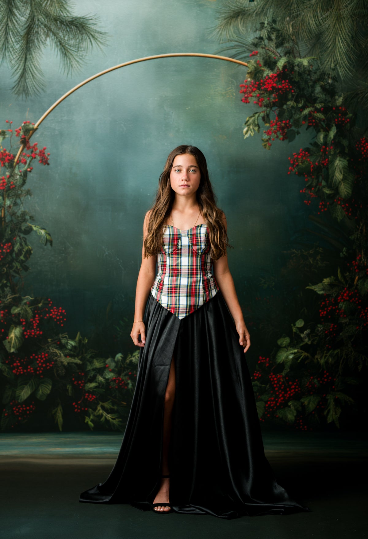Holly Tartan corset paired with Midnight Noel black satin floor-length rental skirt