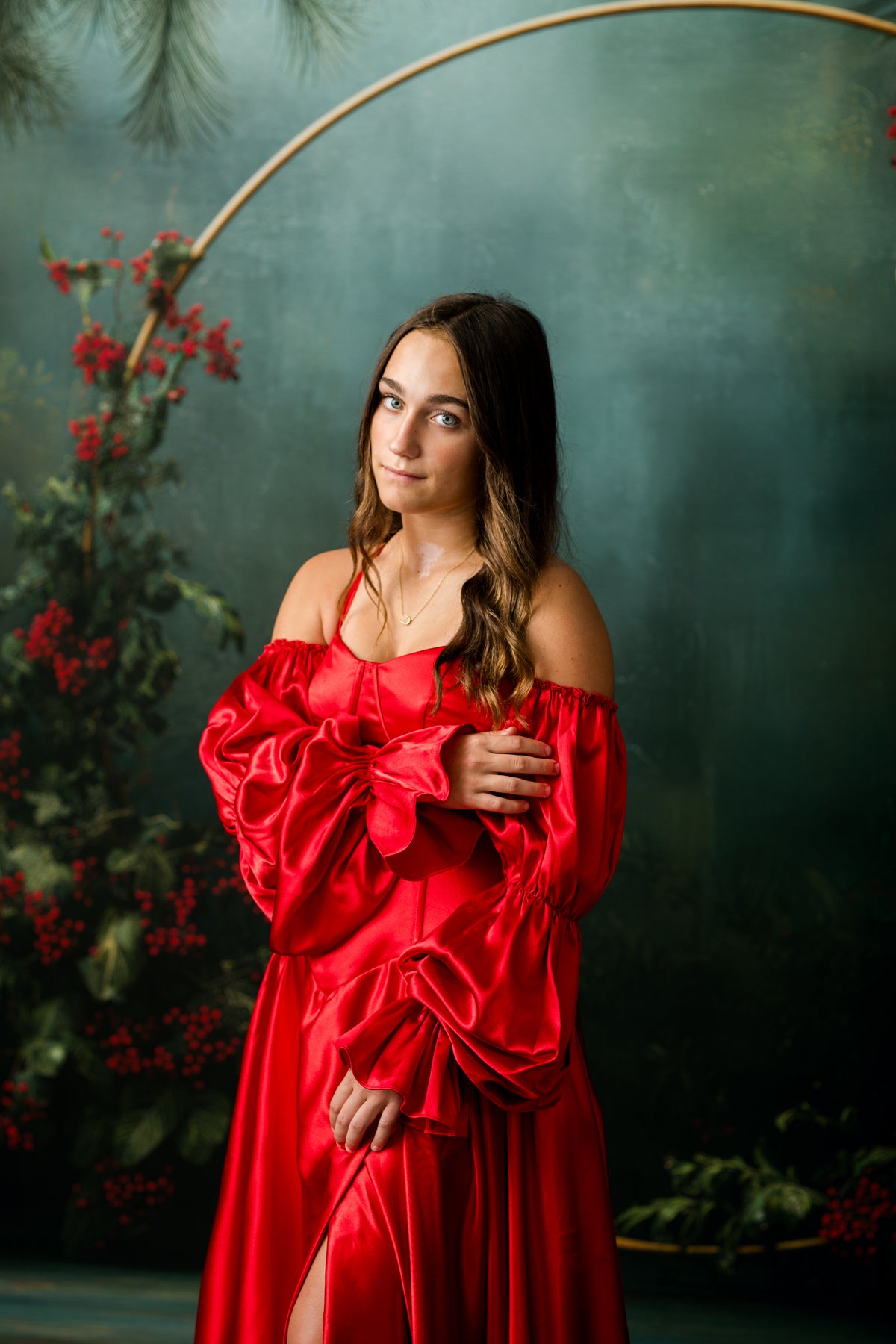 Removable plaid corset styled over Scarlet Noel red satin rental gown