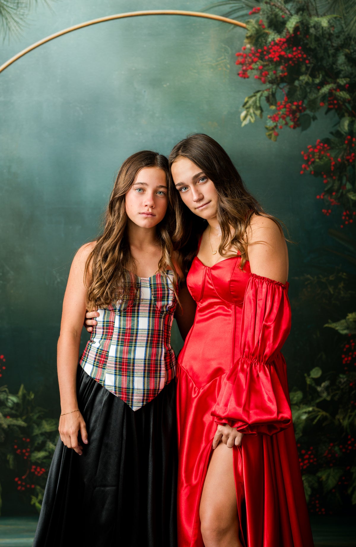 Holly Tartan plaid corset layered over red satin gown for a Christmas portrait session