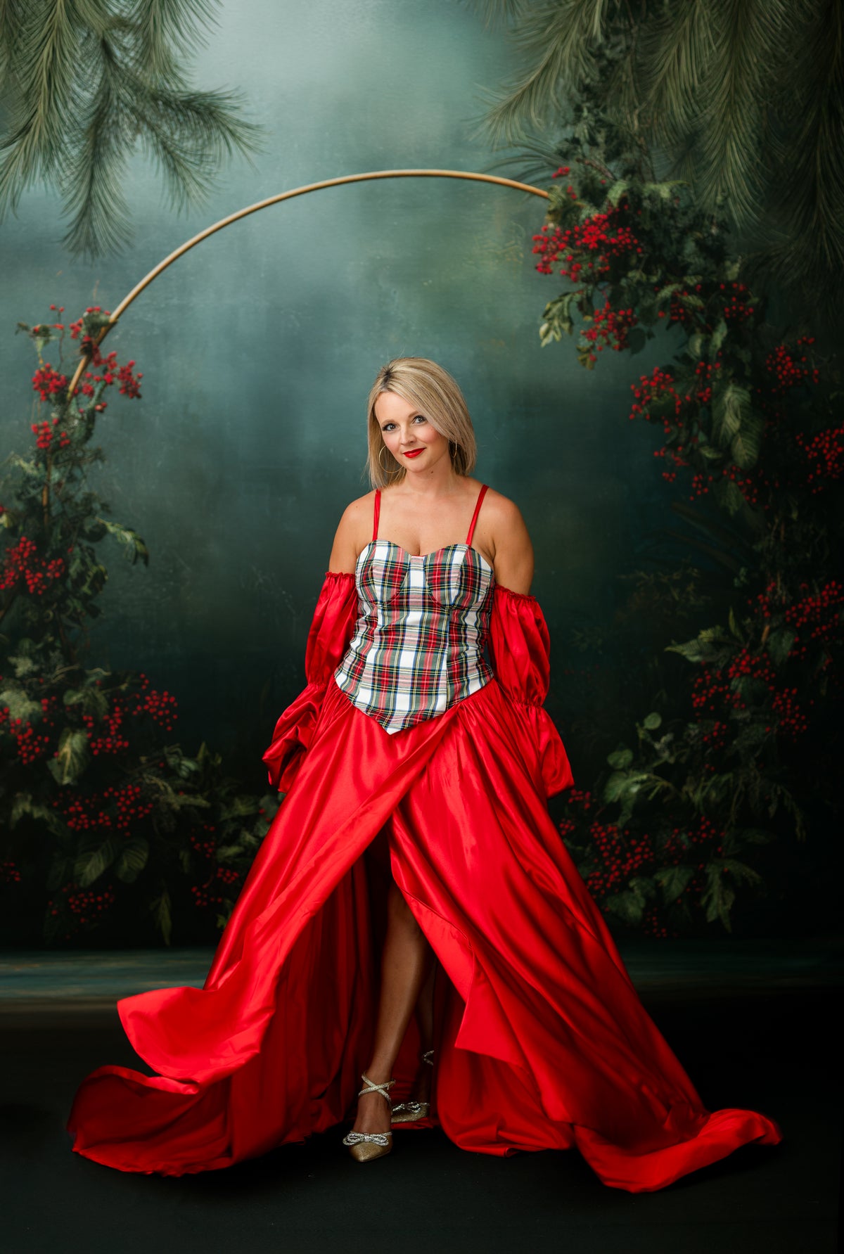 Scarlet red satin floor-length couture rental gown with sweetheart corset bodice