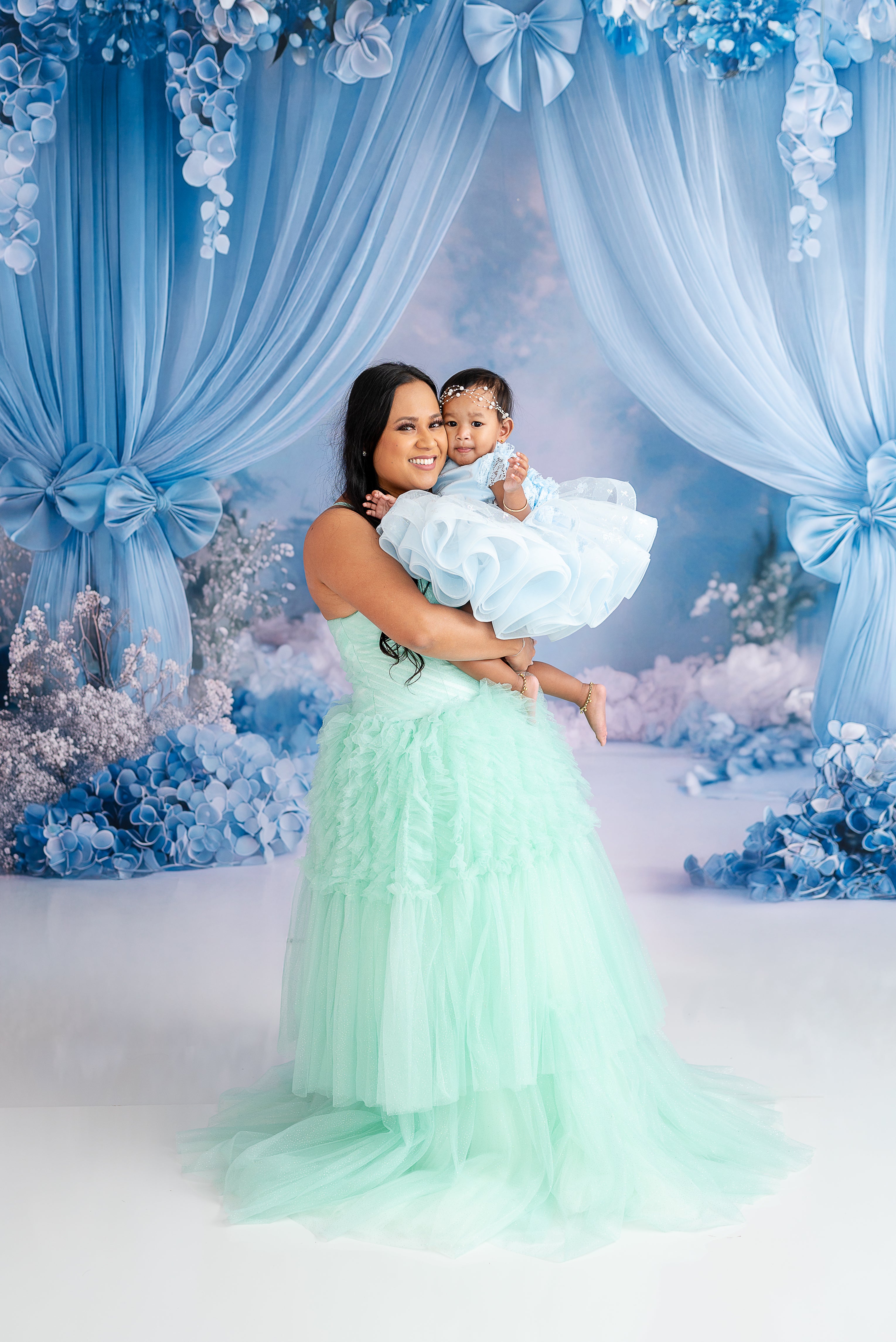 "A tender moment between mother and daughter, styled in exquisite couture gowns."