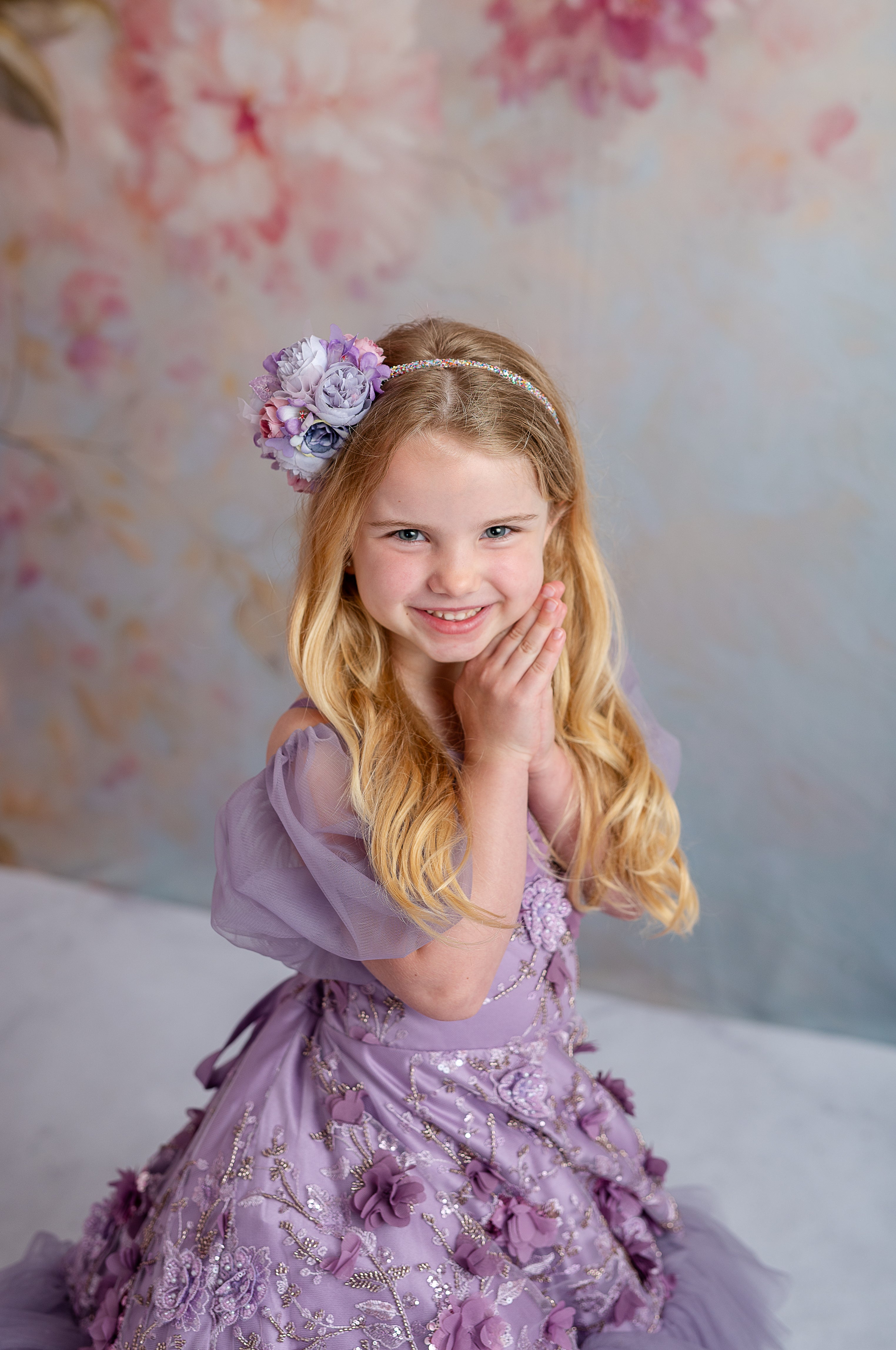 Lavender gown for girls with removable puff sleeves and intricate floral detailing.