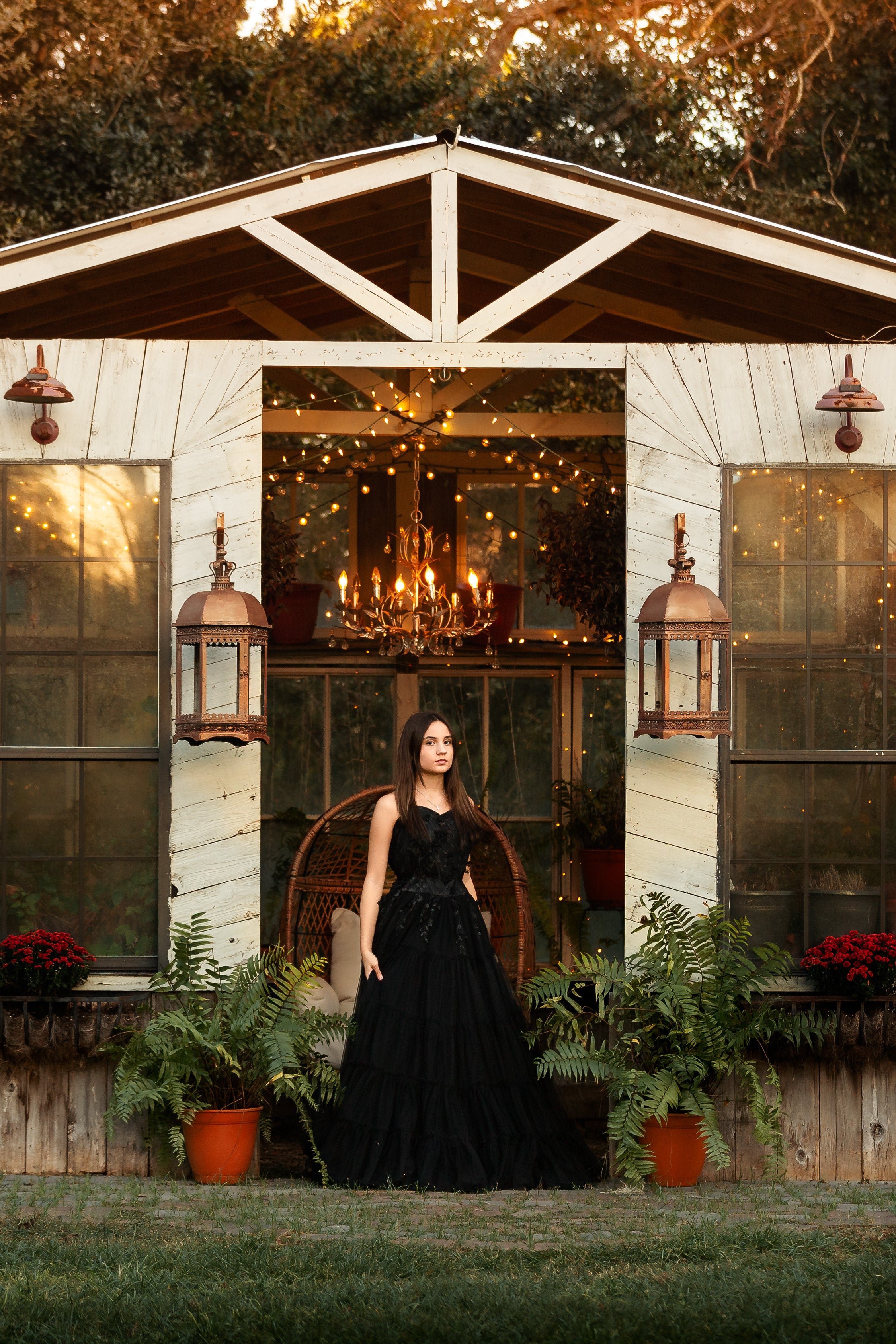 Black couture gown with a flowing tulle skirt, perfect for capturing graceful moments in photography.