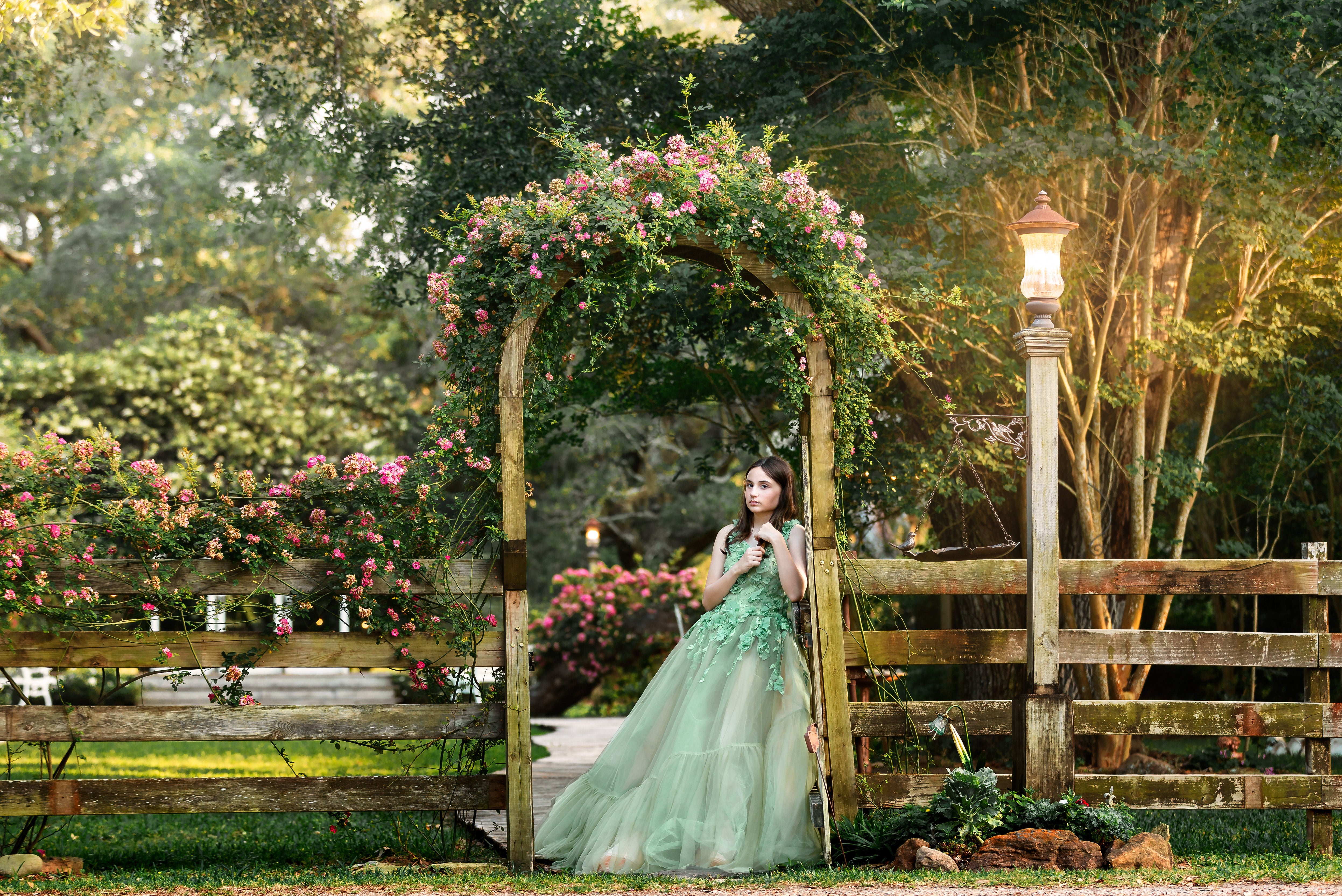 Beautiful girl wearing a couture gown in scenic view