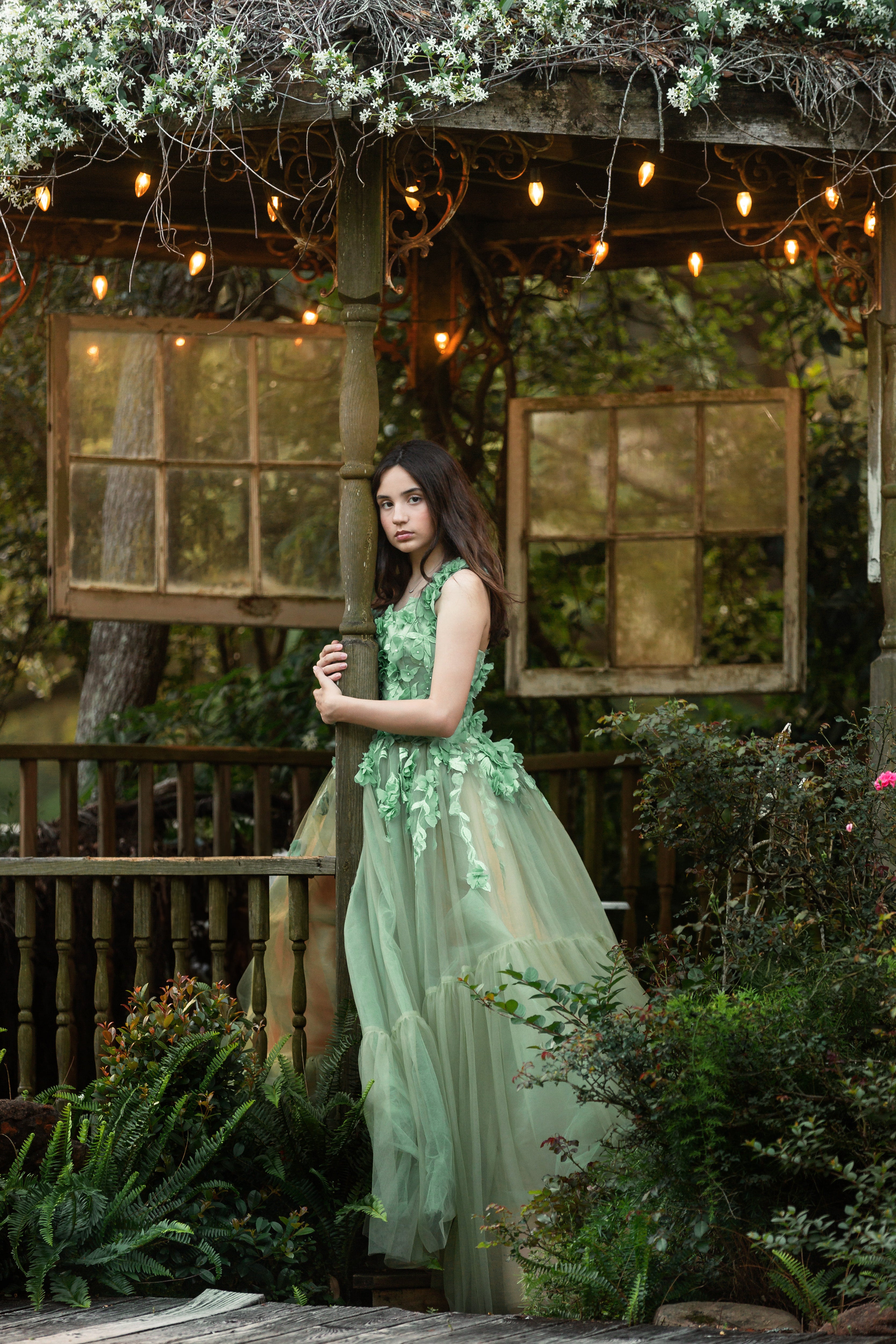 Beautiful girl wearing a couture rental gown for a portrait styled session in Houston.
