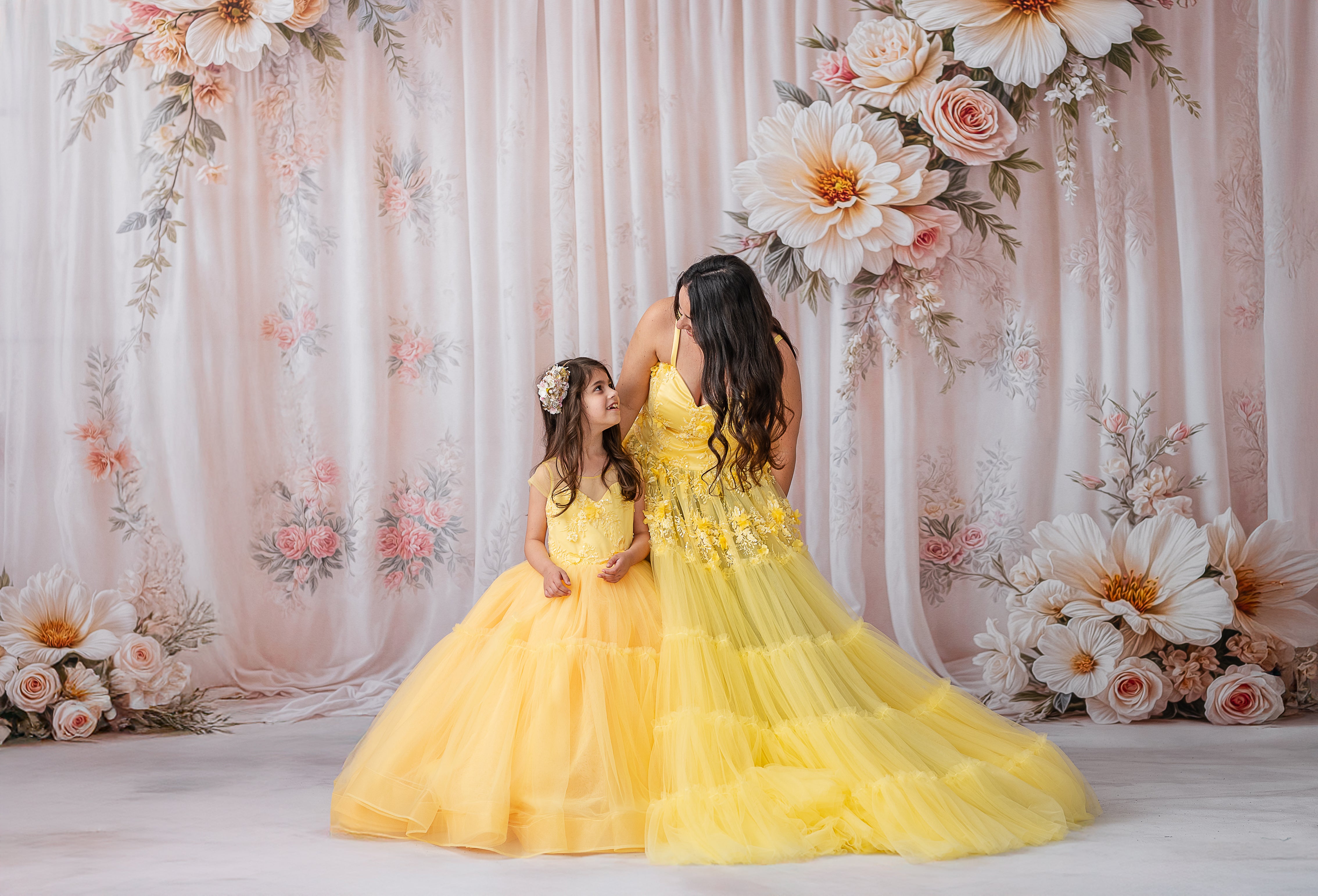 "Adjustable shoulder straps of the Buttercup gown tied into a fully corseted back."