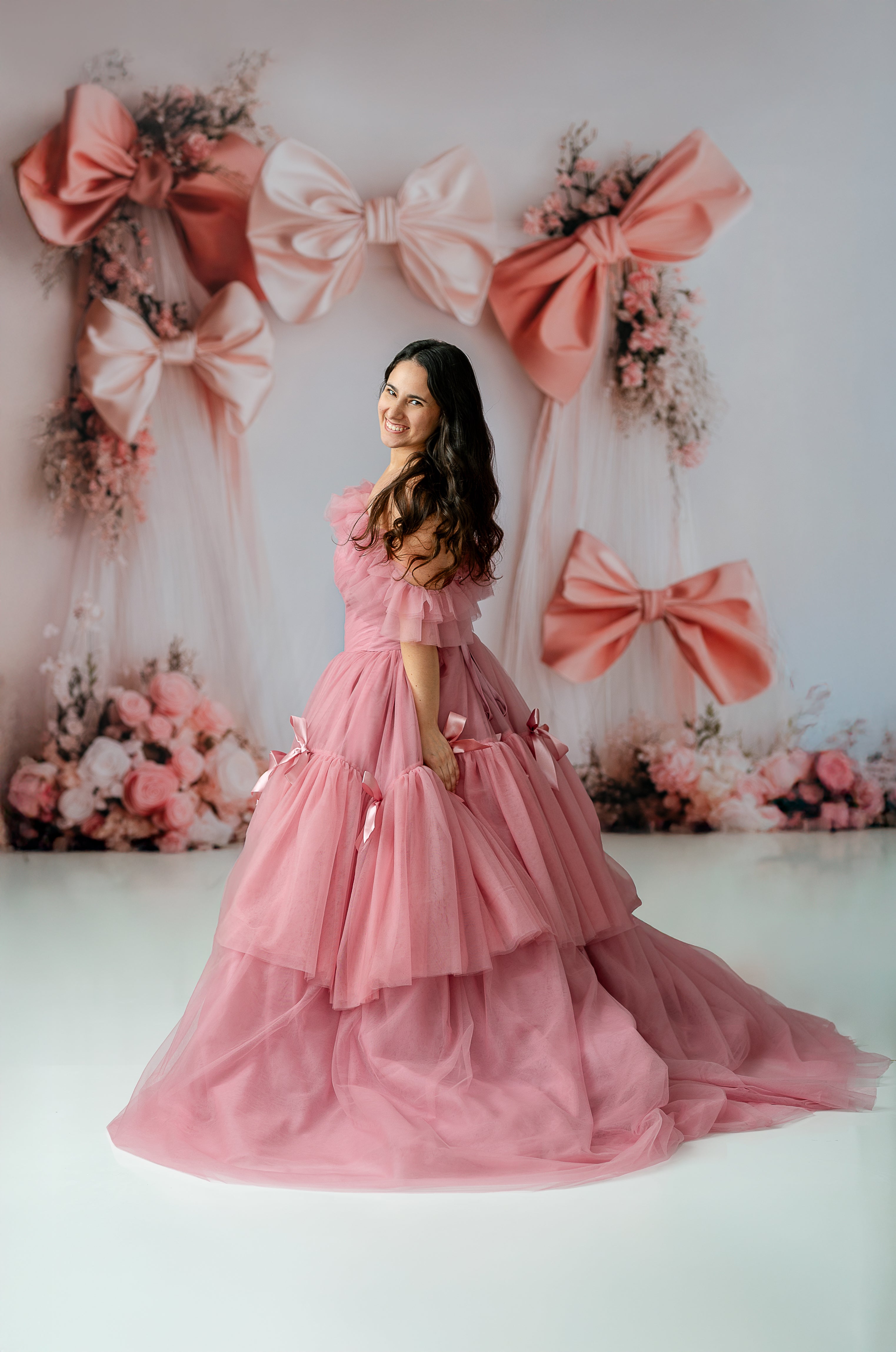 "Hand-sewn bows ensure a personal, unique touch on the Bows of Grace gown."