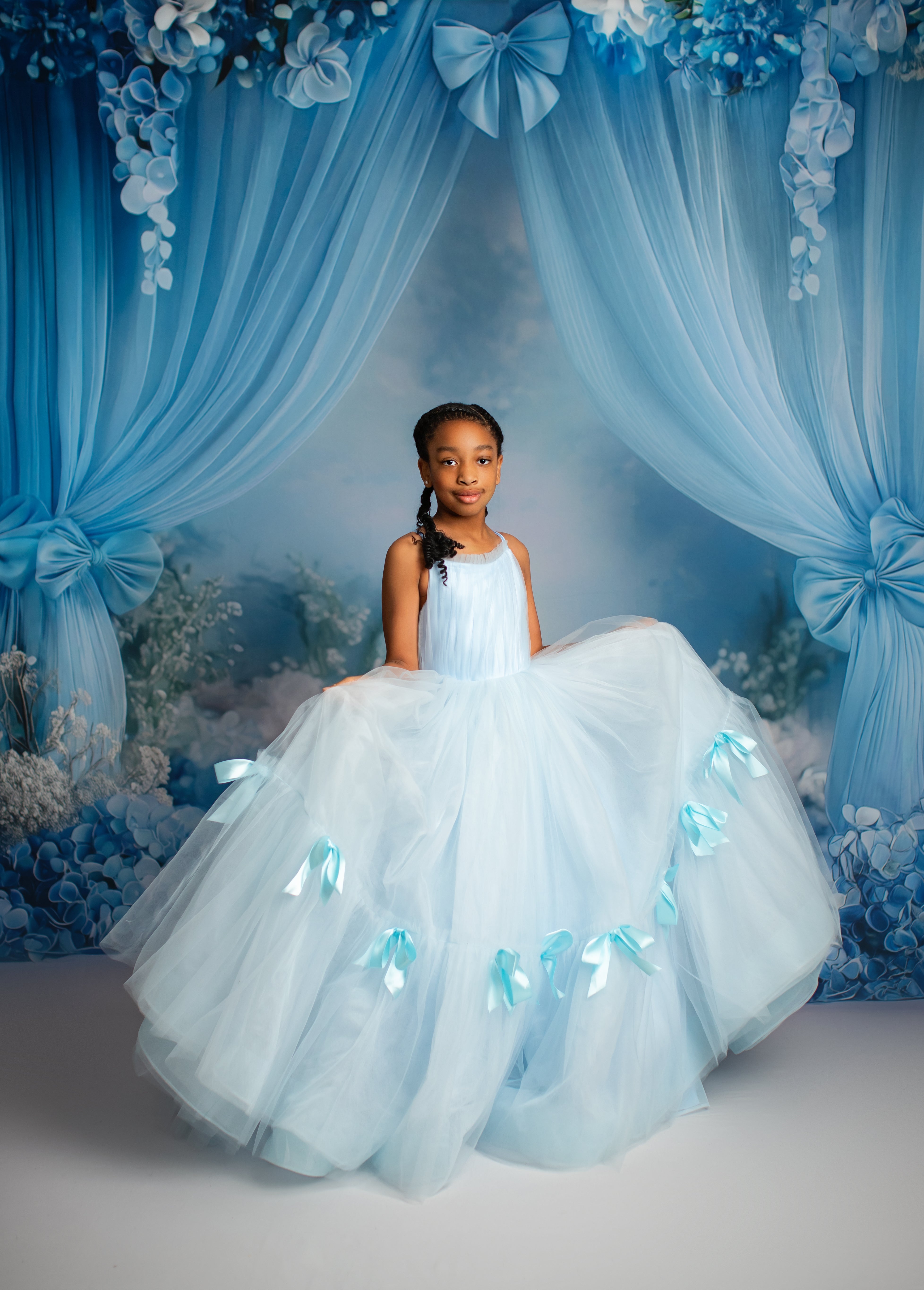 Whimsical and romantic, this soft tulle gown exudes elegance and charm.