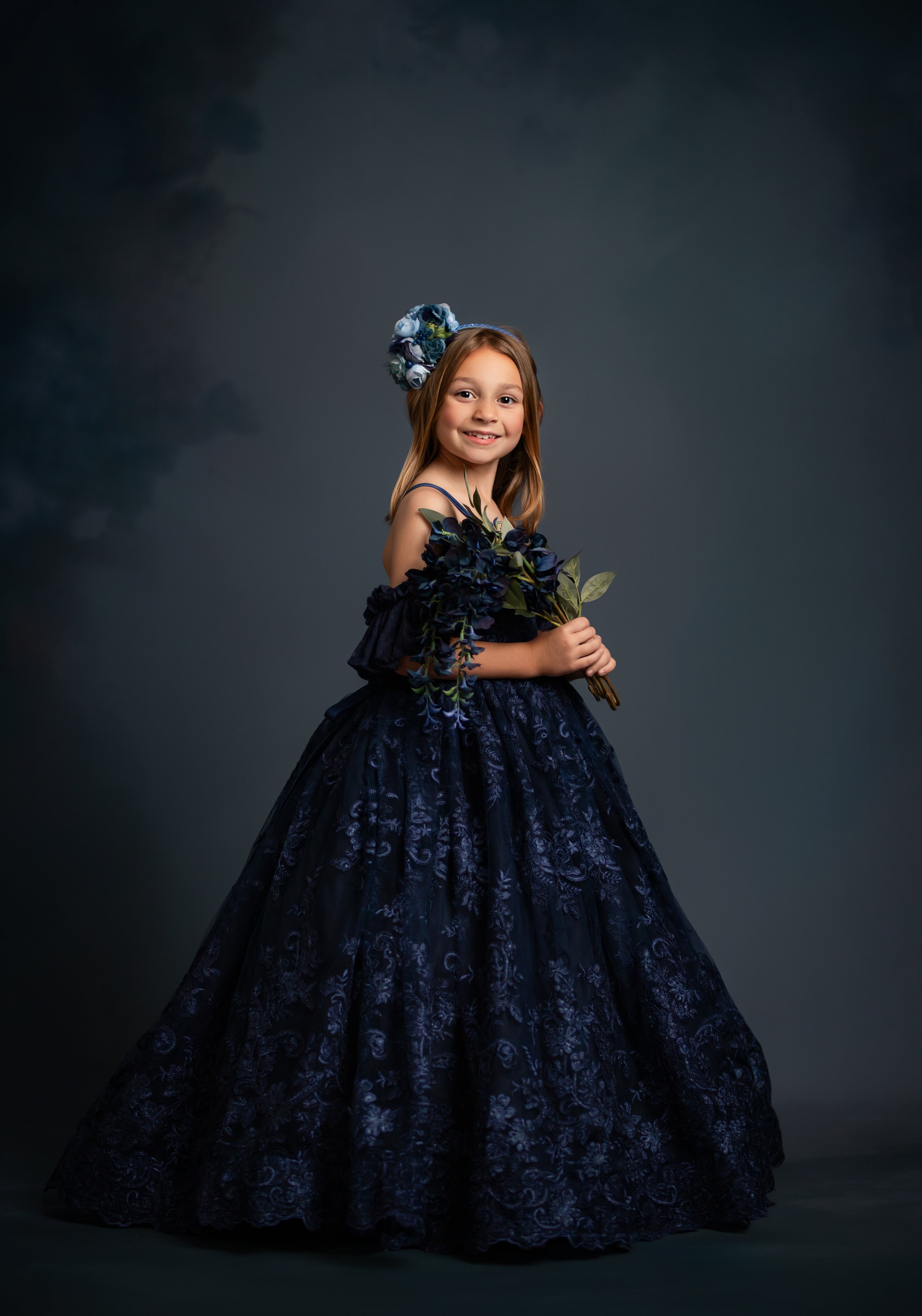 "Elegant embroidered lace gown perfect for milestone celebrations and birthday portraits"