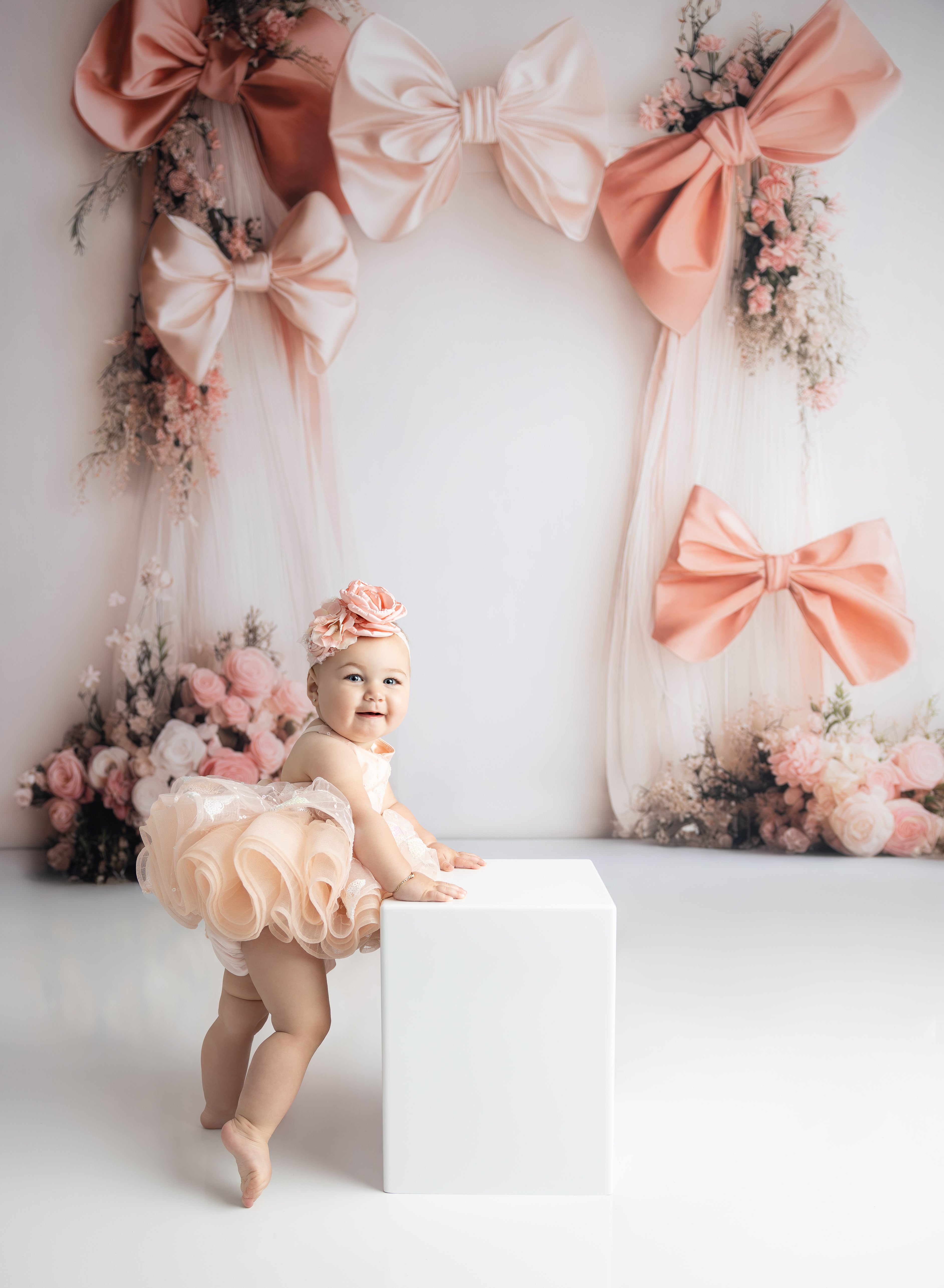 "The Vera petal-length dress in a dreamy pastel hue, ideal for first birthdays and special occasions."