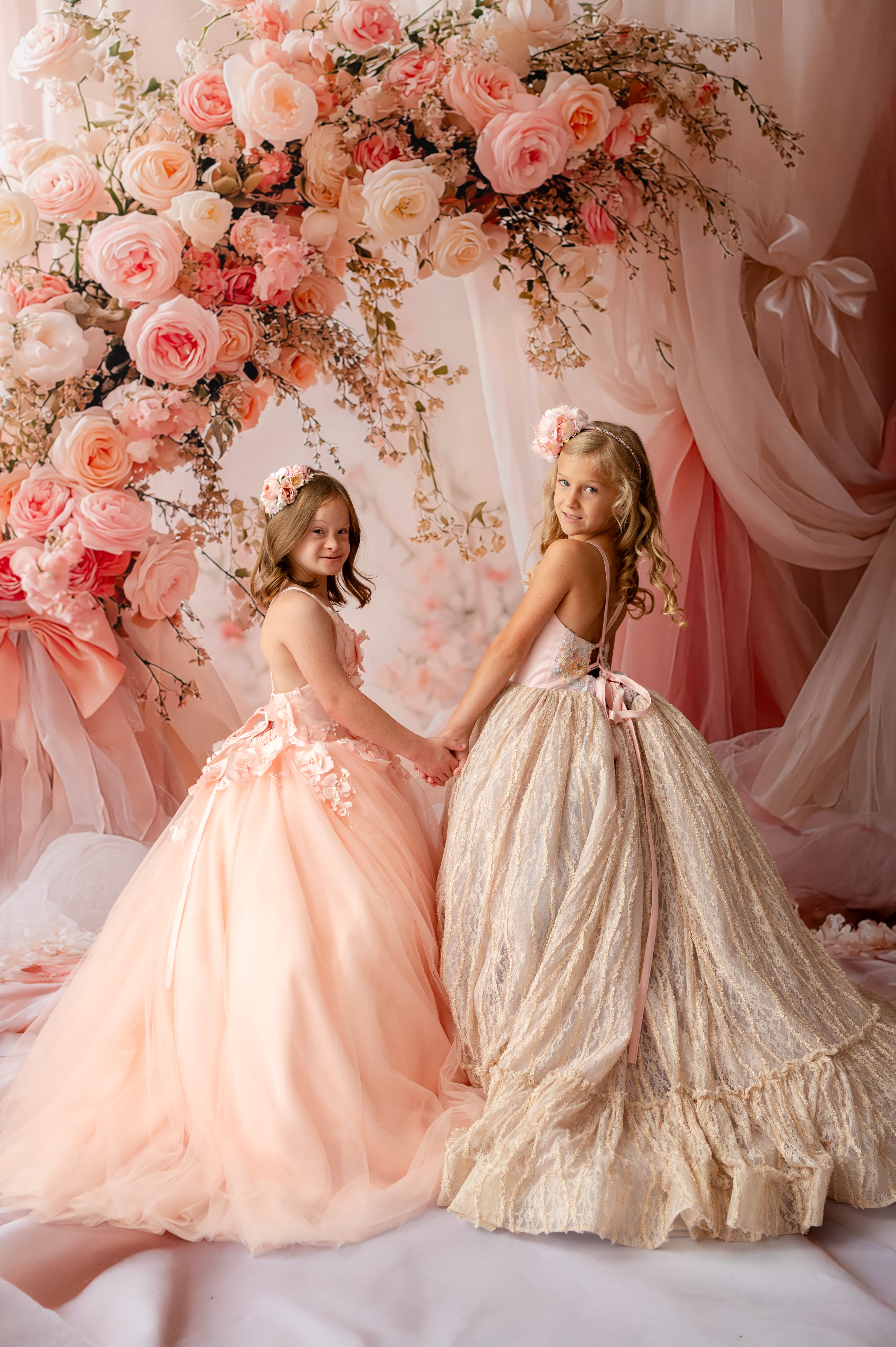 "Elegant flower girl dress with embroidered bodice and flowing lace skirt"