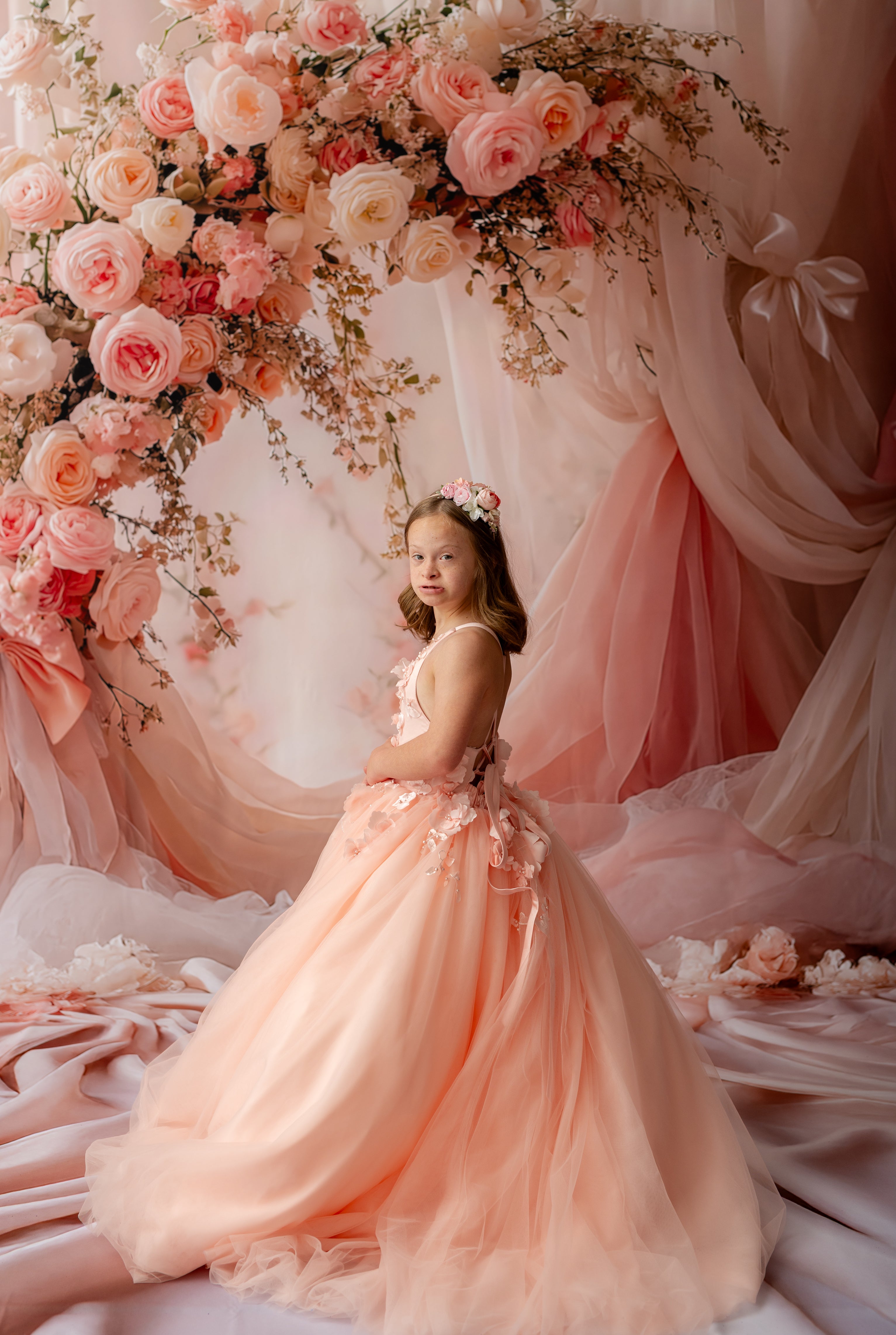 "Whimsical peach couture gown for girls with dreamy tulle and flower appliqués"