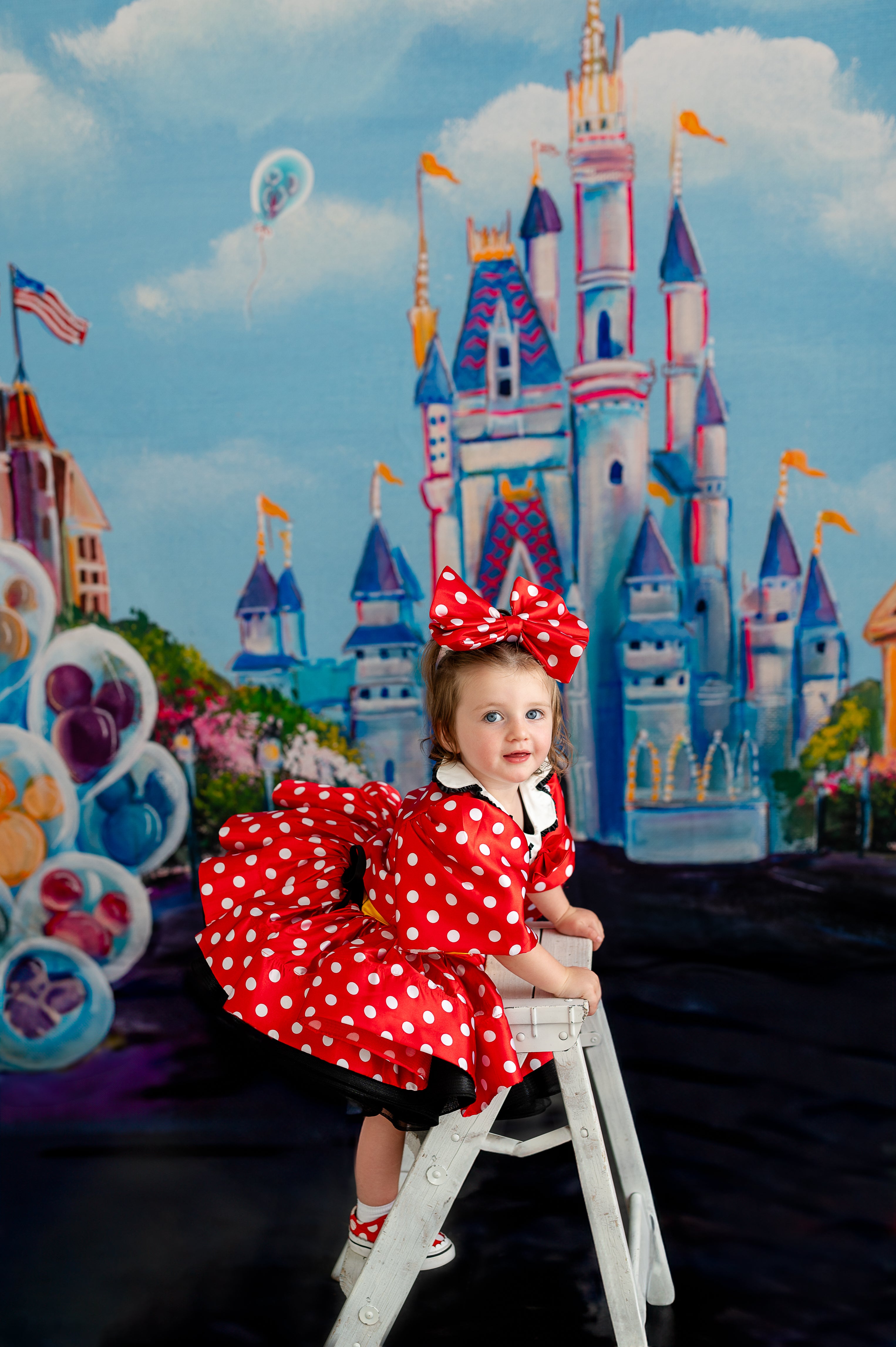"Cute red dress with white polka dots, designed in the spirit of Minnie Mouse, featuring puff sleeves and a matching black headband."
