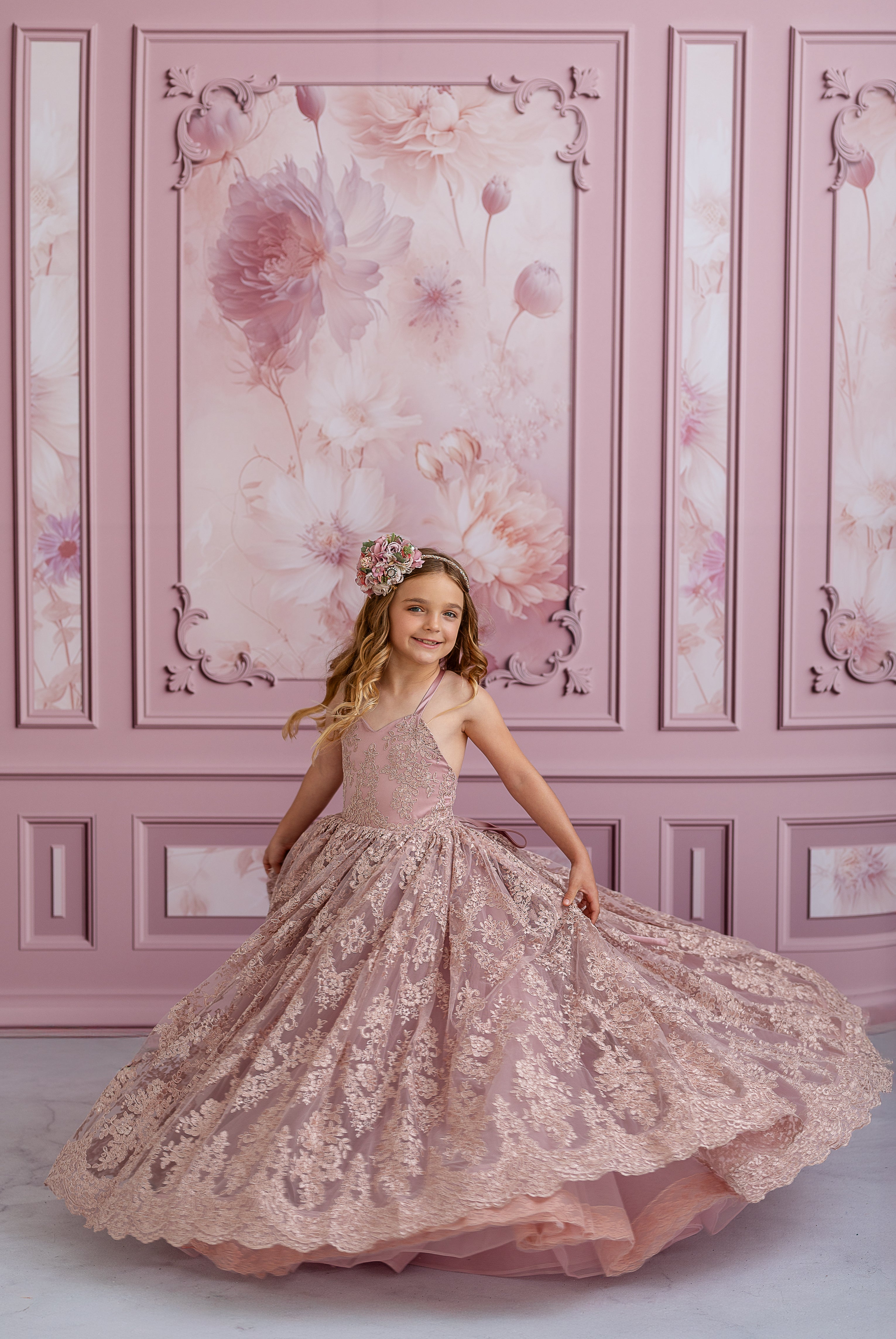 "Elegant couture dress with intricate lace detailing and subtle shimmer, displayed on a mannequin"