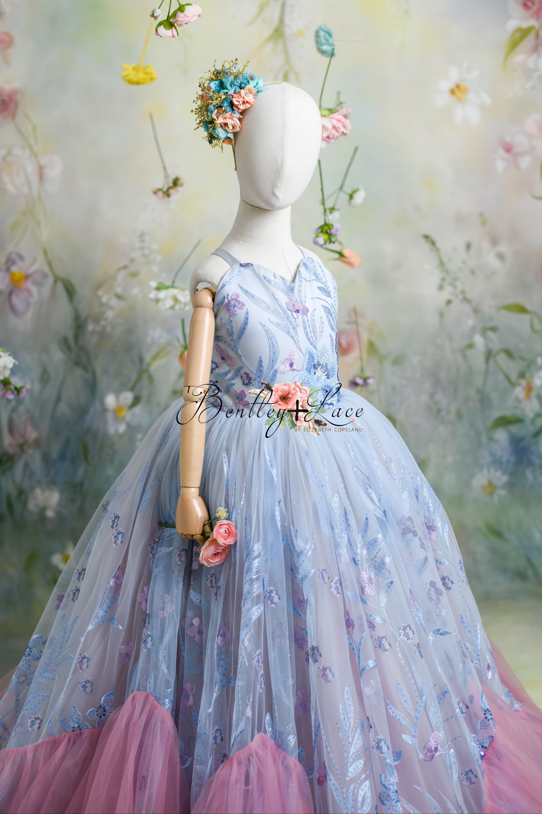 "Full view of the Savannah Bloom gown featuring a floor-length tulle skirt and intricate lace bodice."