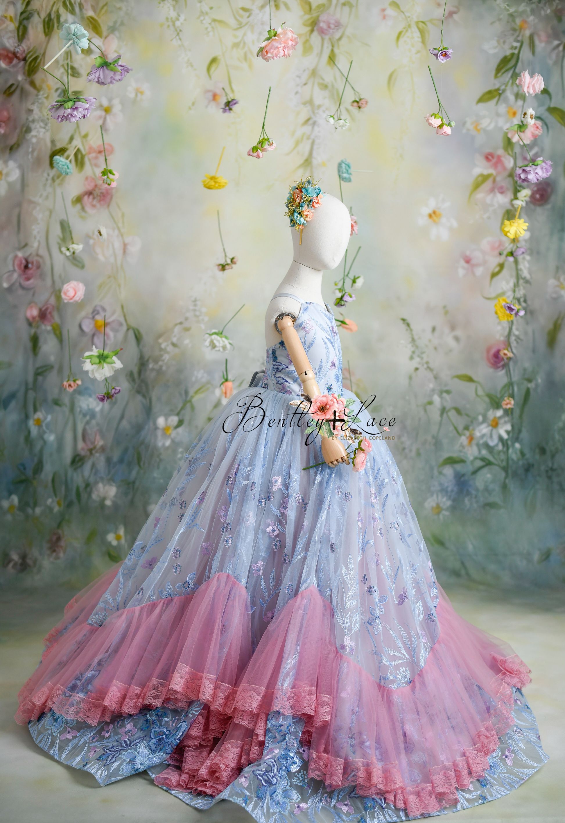 "Savannah Bloom gown with floral sequin accents and delicate lace, ideal for petite princesses aged 6 to 9."