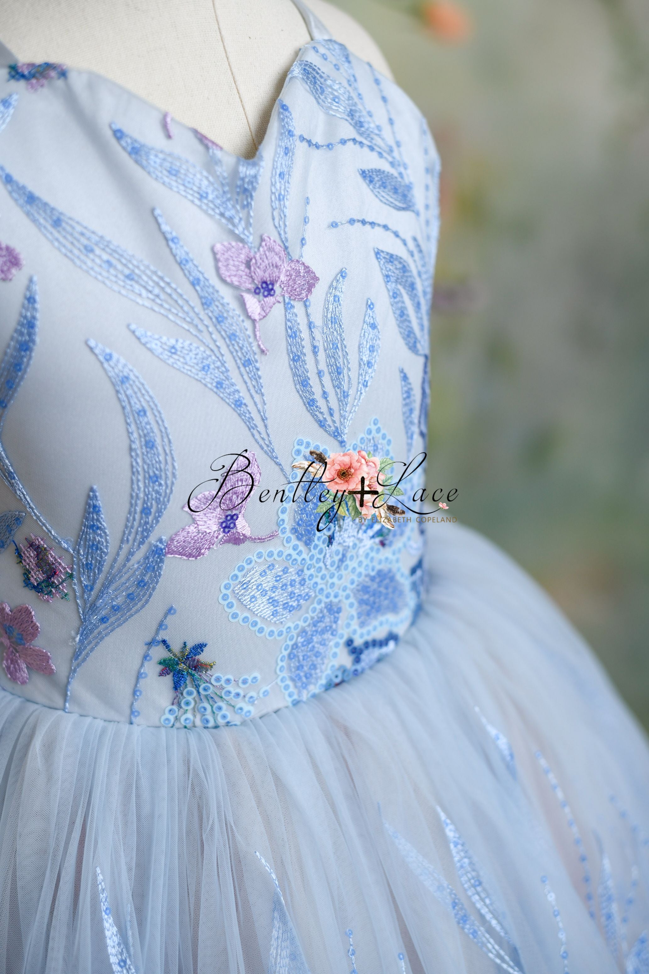 "Close-up of the Savannah Bloom gown's soft, fully lined tulle skirting, designed for comfort and elegance."