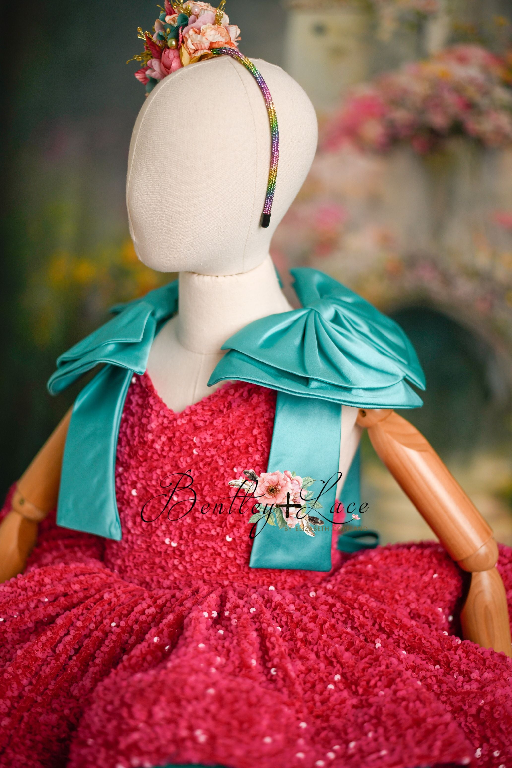 Retro Christmas-themed pink sequin dress with adjustable shoulder ties for kids