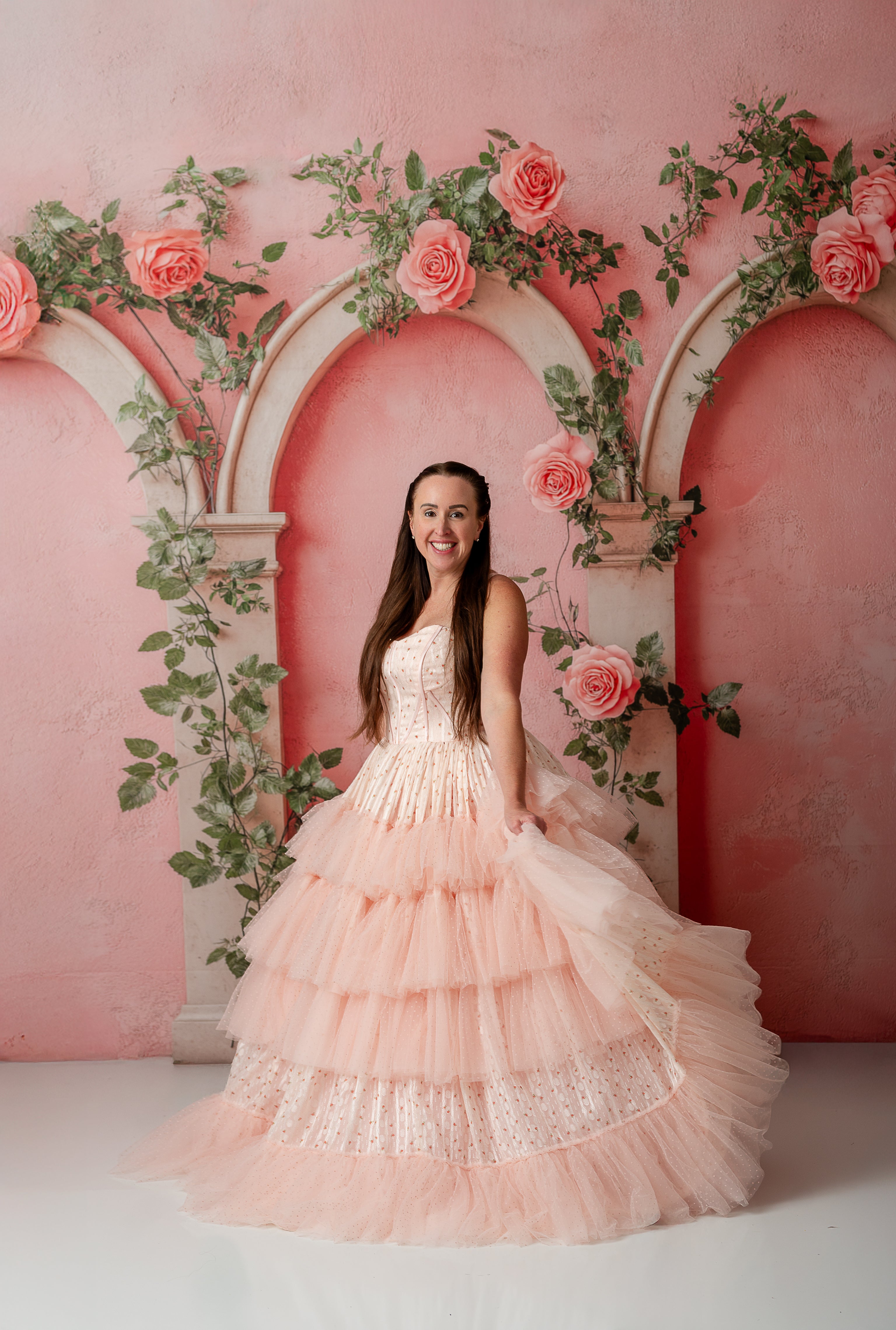 Back view of corset-style lacing and adjustable shoulder ties on Sugar Rosette gown