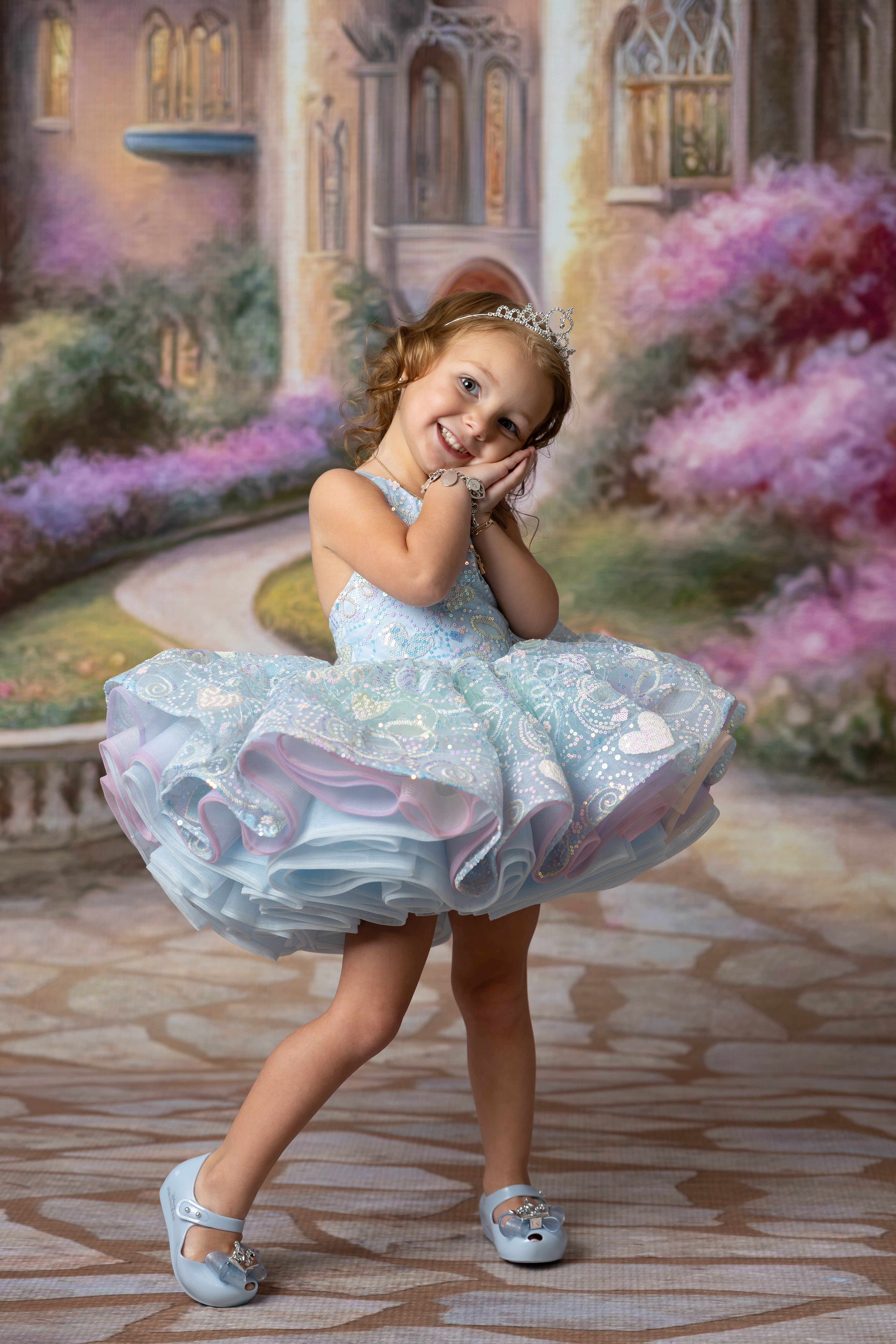 Whimsical children’s birthday dress with rainbow ombre tulle and sequin bodice.