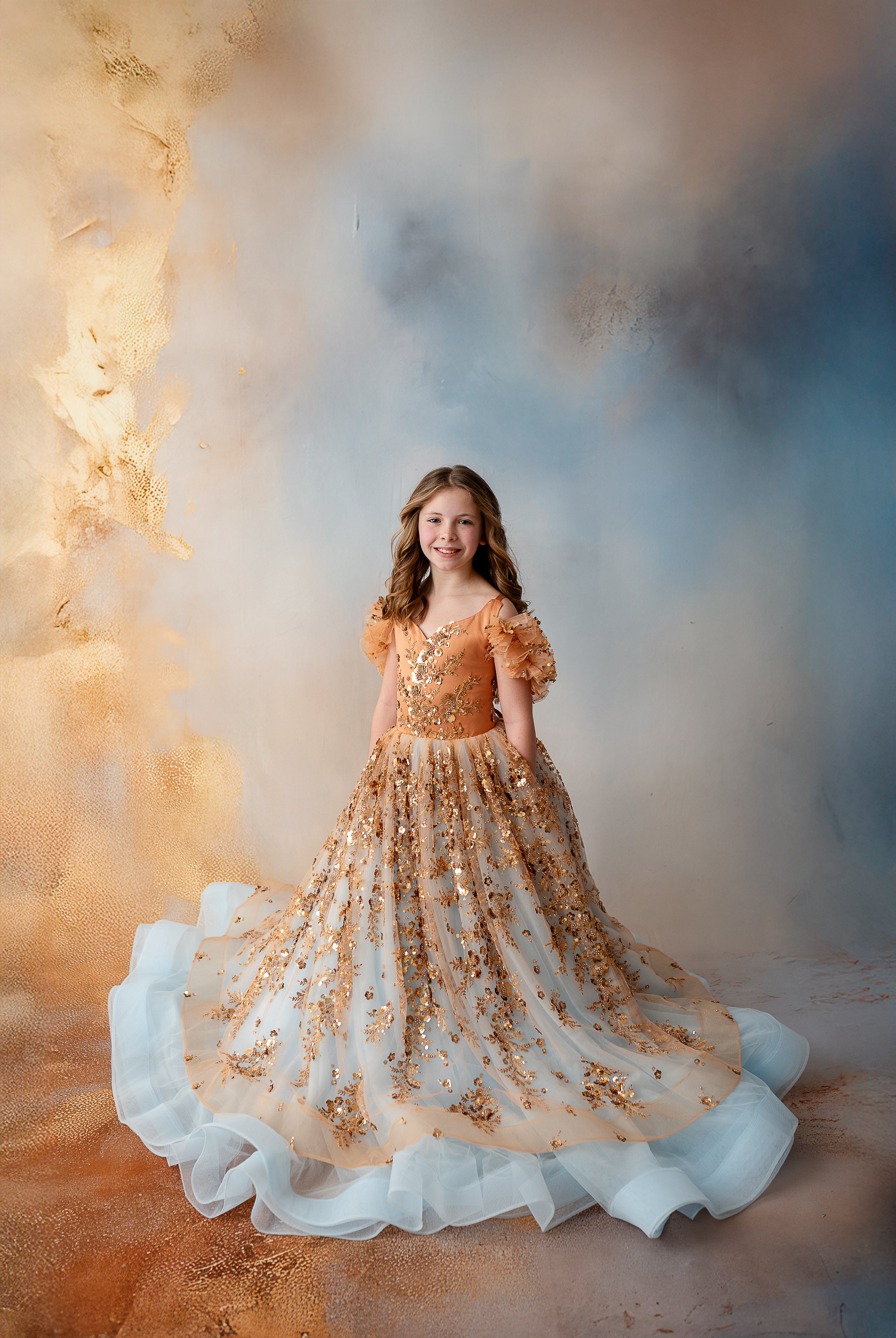 "Experience elegance with Cinderella’s Glow, showcasing shimmering sequins, adjustable shoulder ties, and a graceful, twirl-ready design."