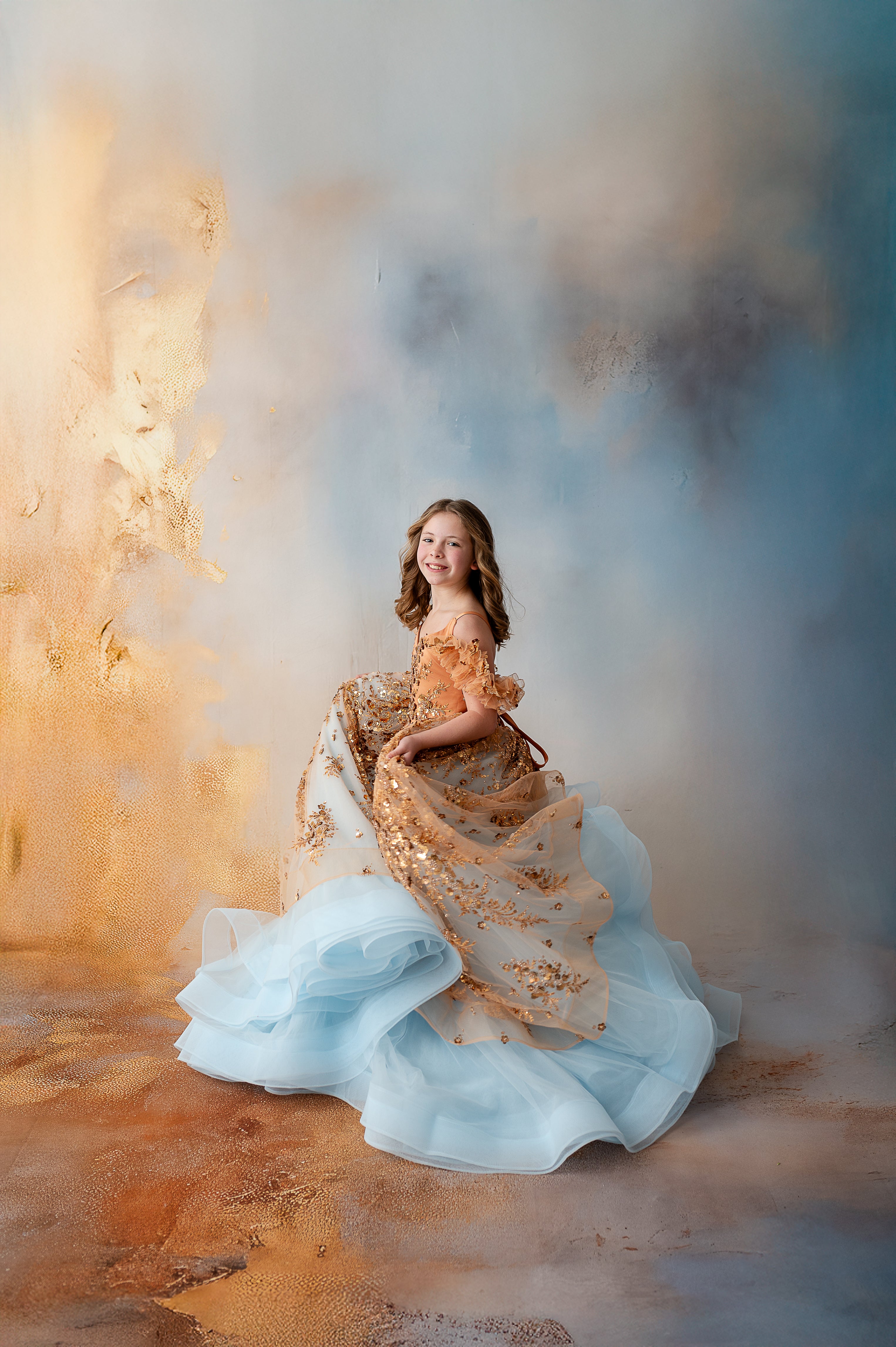 "Close-up of the Cinderella’s Glow gown’s delicate golden sequins and airy tulle skirt, crafted for unforgettable moments."