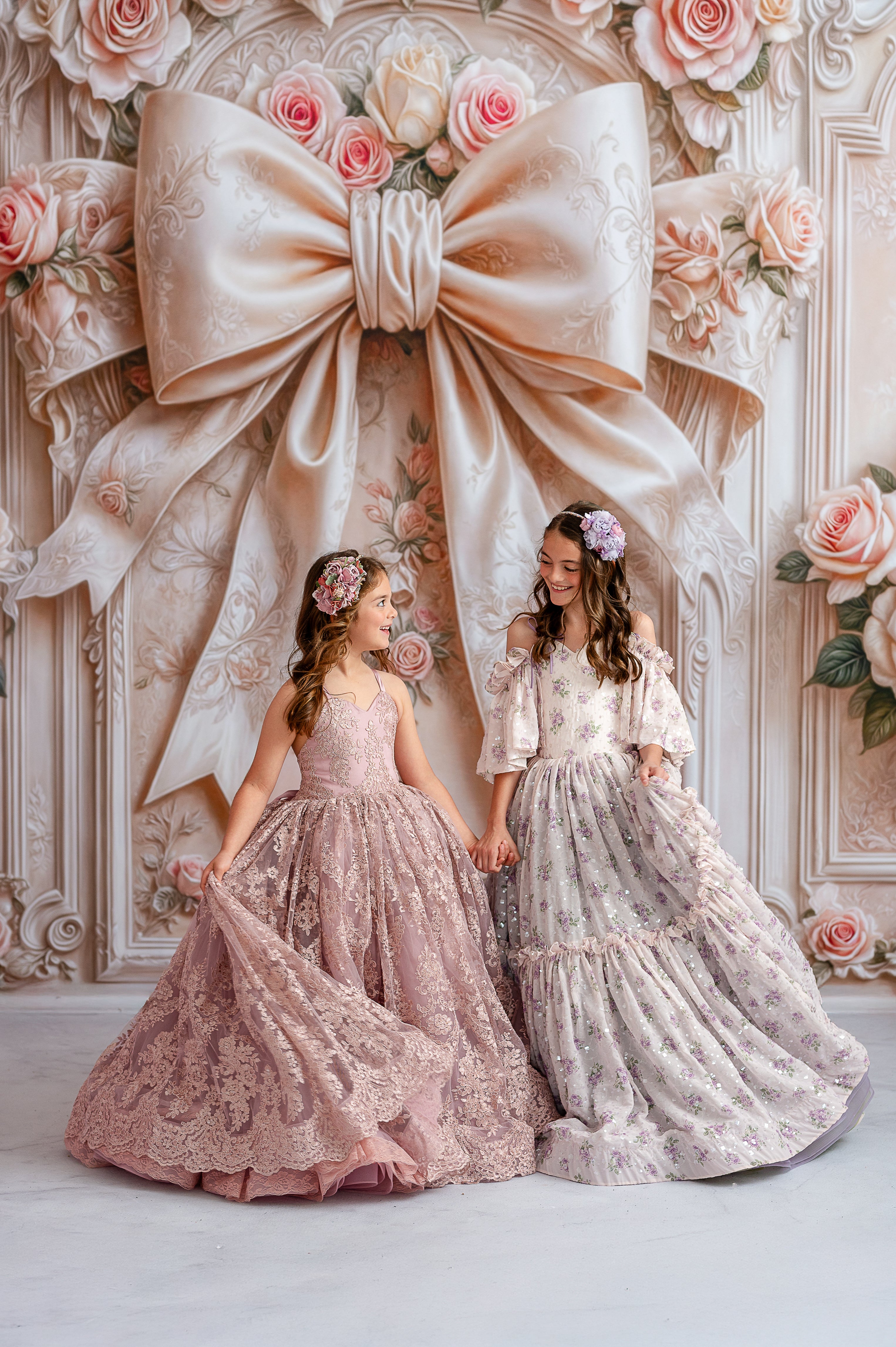 Timeless floor-length gown in Dusty Mauve, designed with a sleeveless lace bodice and tiered skirt, suitable for young girls' special occasions.