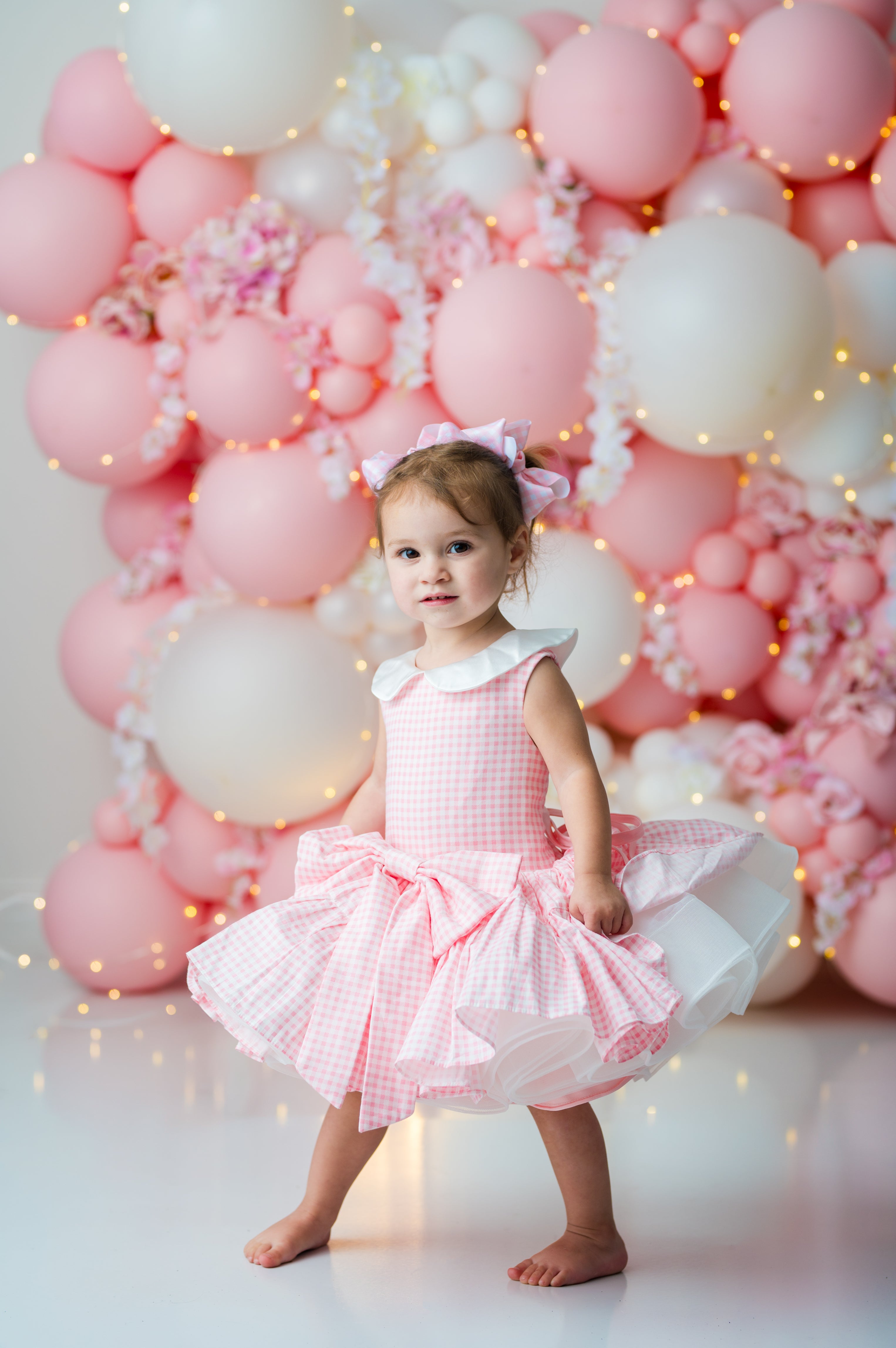 Peachy pink gingham dress with detachable white satin sash