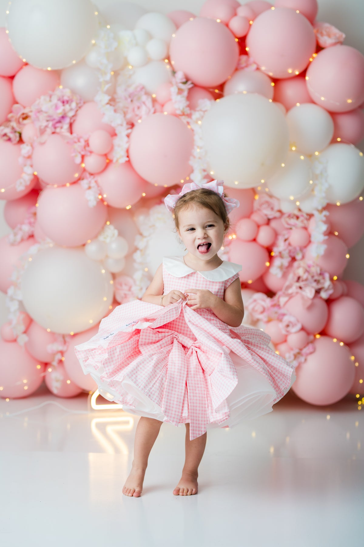 Reversible girls couture dress in pink satin and gingham