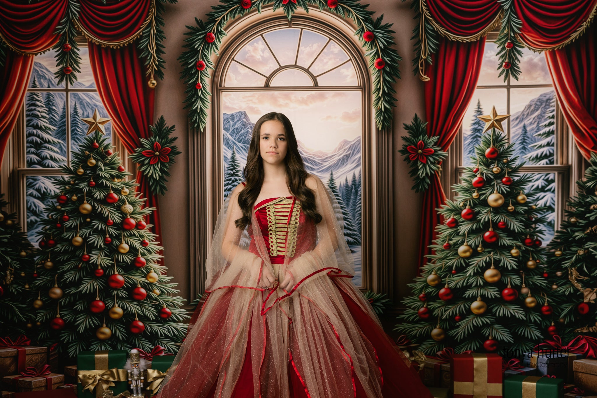 Holiday-themed photoshoot featuring Nutcracker Ballet Princess gown in red