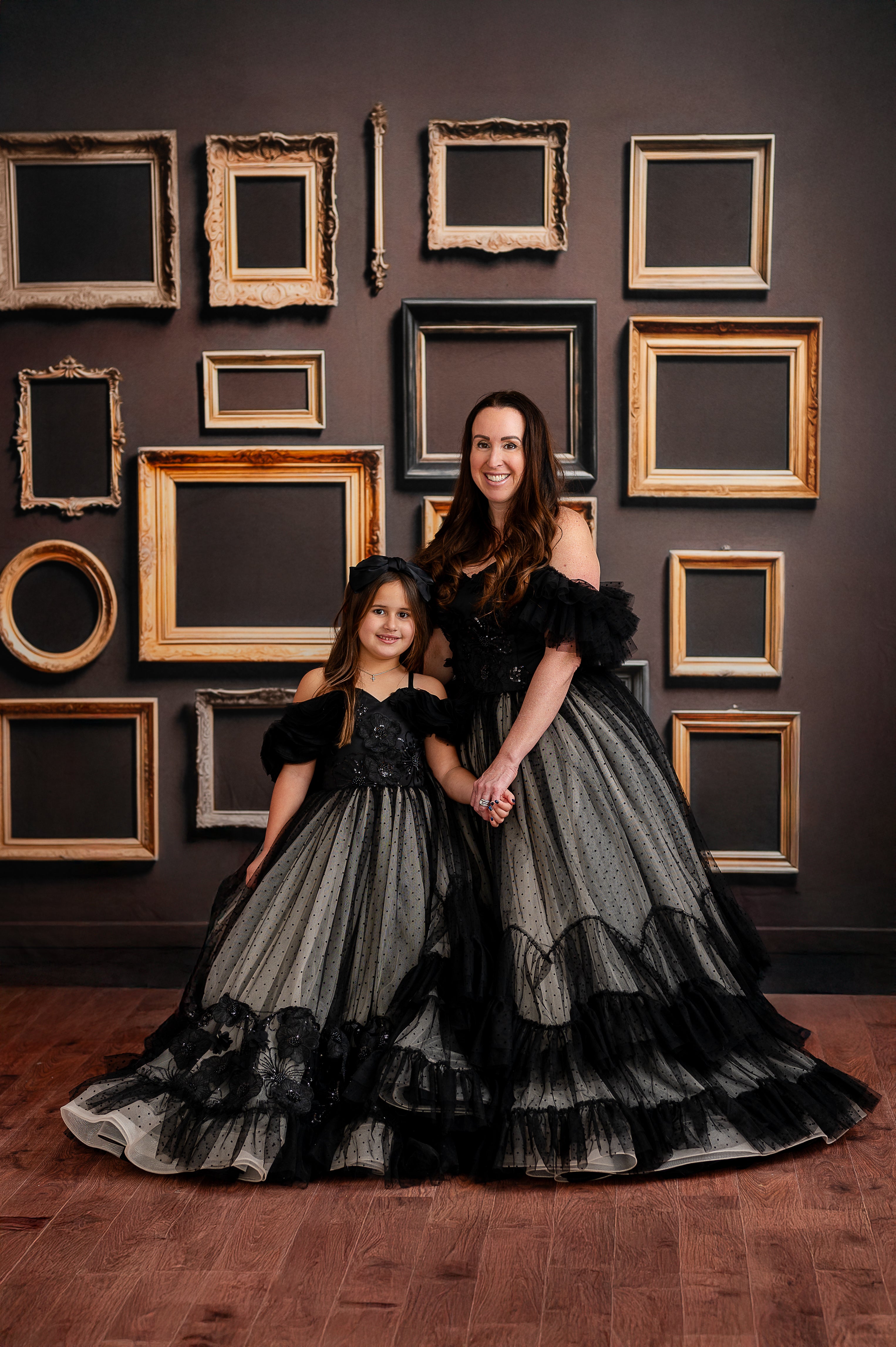 A side profile of the Swish Dot gown, highlighting its structured bodice and flowing skirt.