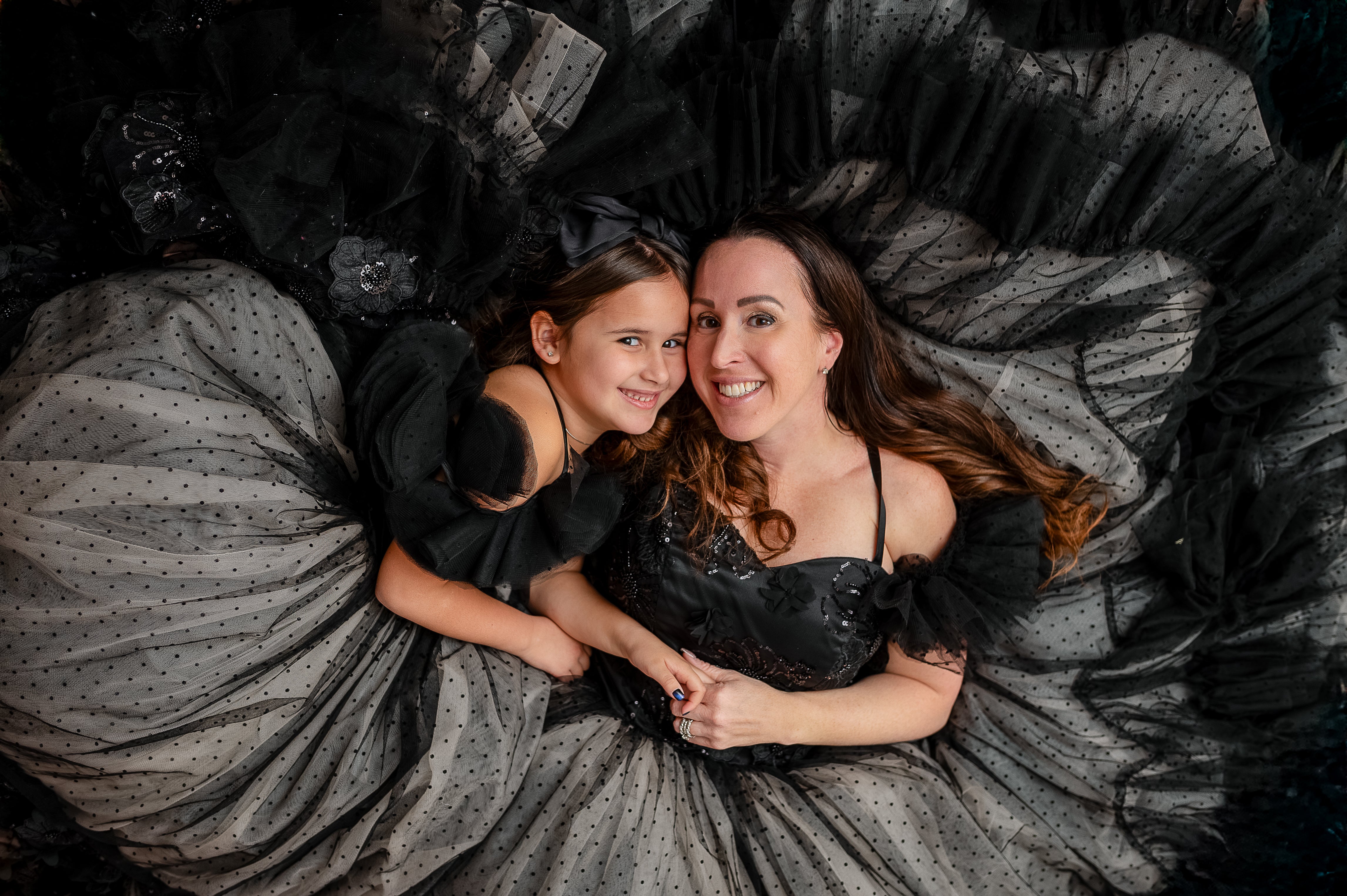 A stunning couture gown with intricate detailing, perfect for styled photography sessions.