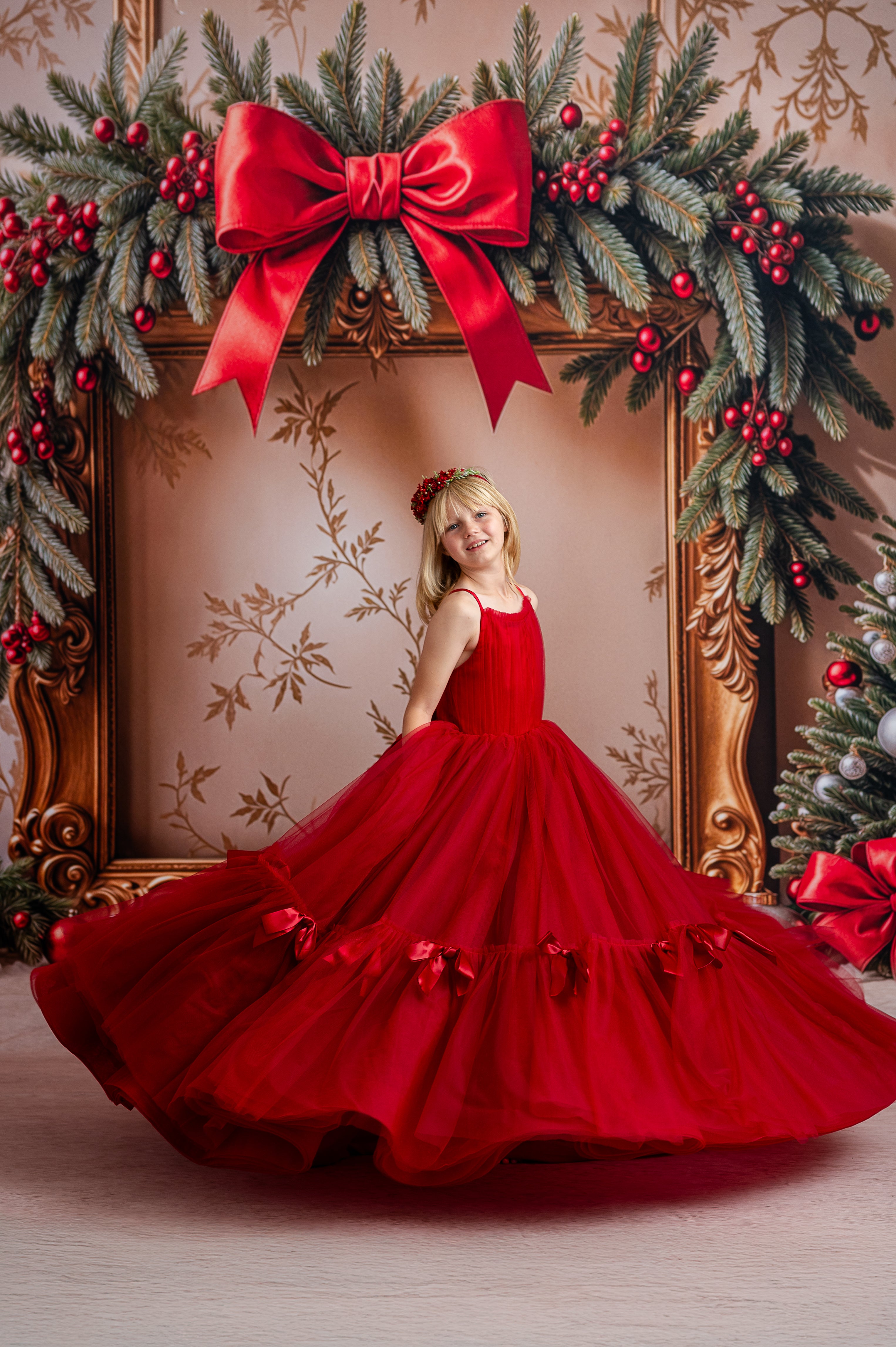 Girl wearing Bows of Grace gown with handmade satin bows and rounded neckline