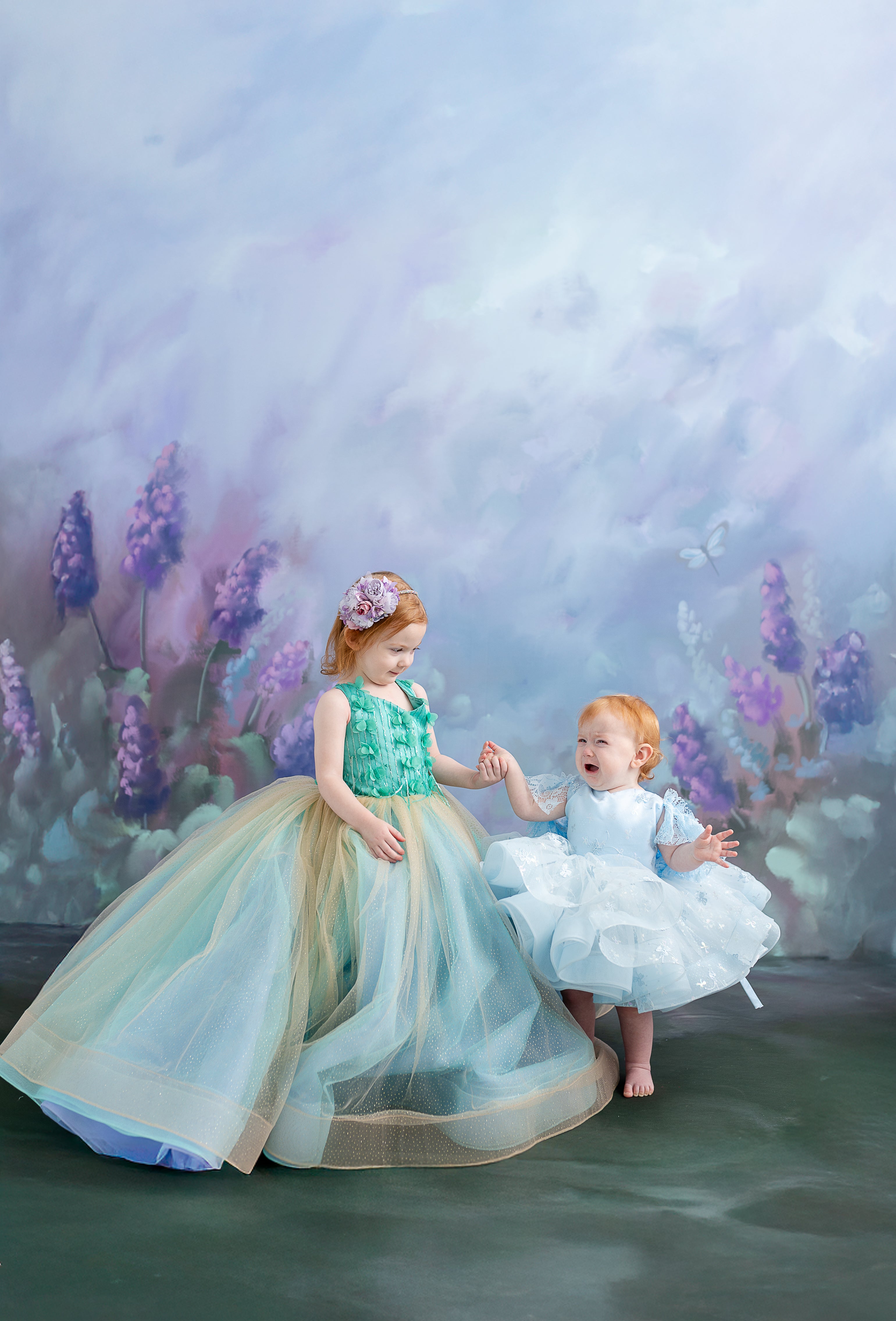 A detailed shot of the gown’s hemline, showing its structured yet airy movement.