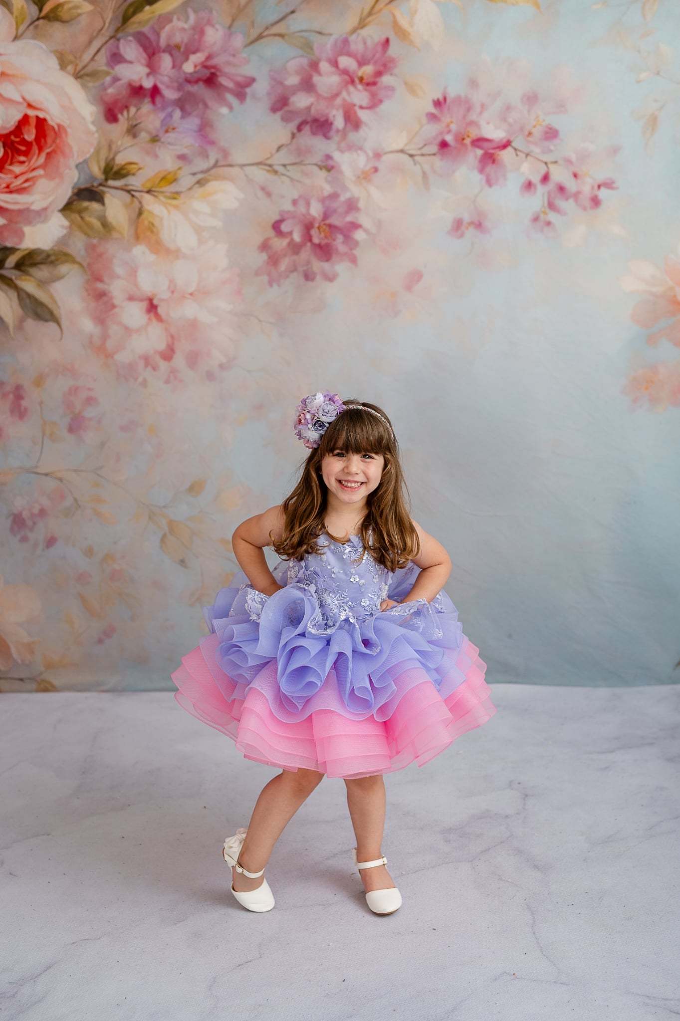 "Full shot of the Lilac Enchantment dress showcasing its dreamy layered tulle skirt, creating a flowing and whimsical look."