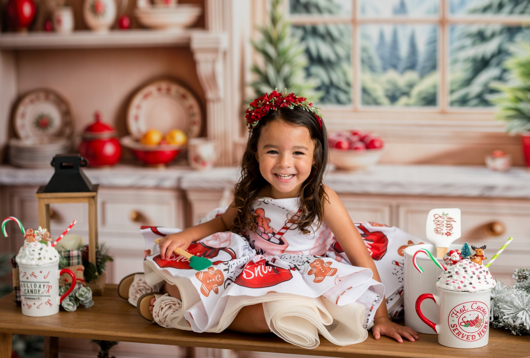 Girl in Hot Cocoa dress posing for holiday photo session