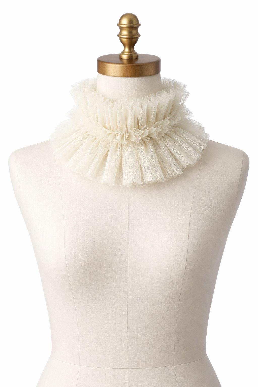 Mannequin wearing a white ruffled collar with a gold top on a white background