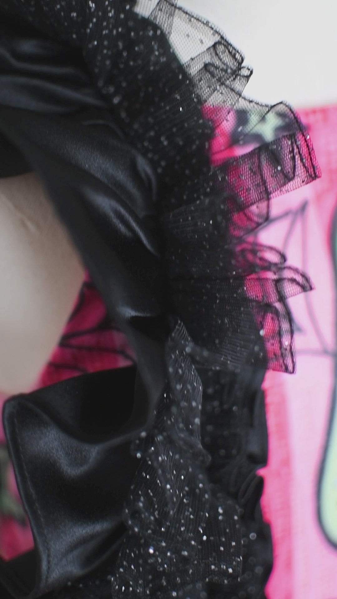 Full view of a custom Halloween ghost-themed dress with vibrant pink and green colors