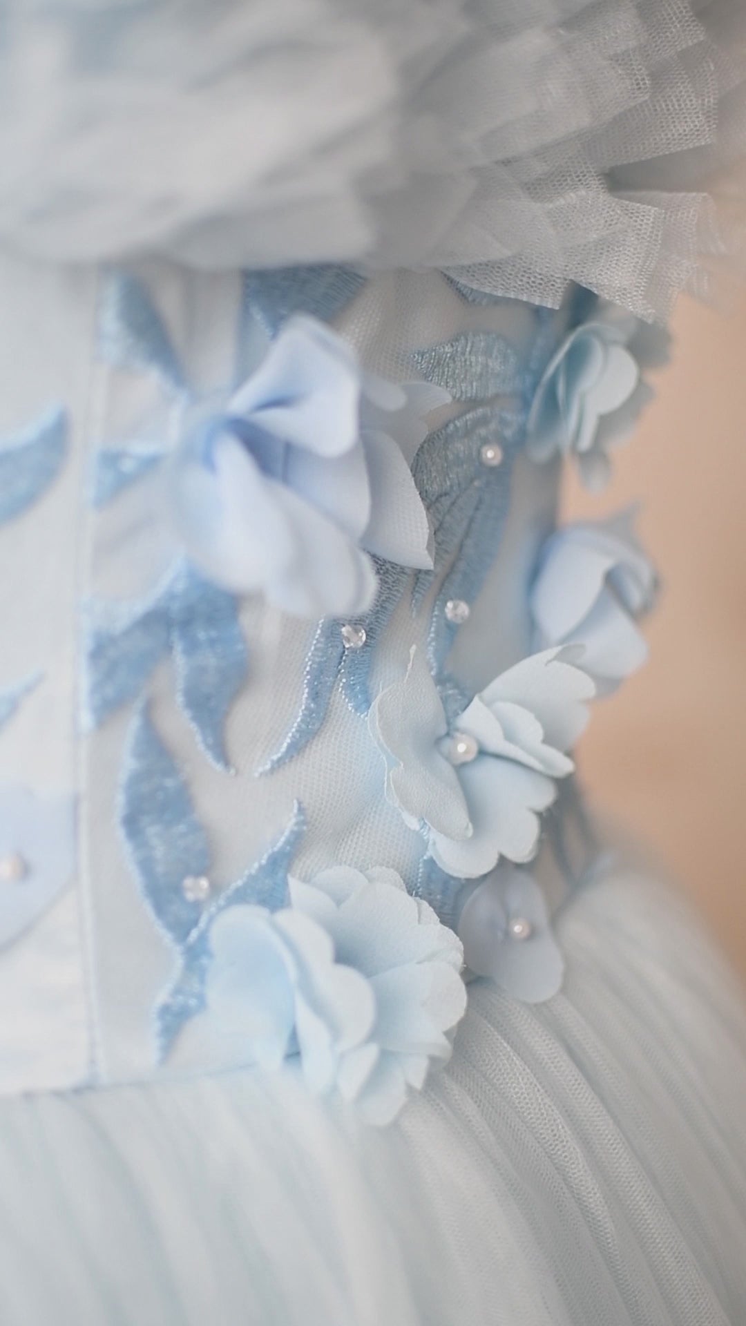 The Heavenly gown displayed in a styled photoshoot, featuring its graceful, timeless silhouette.