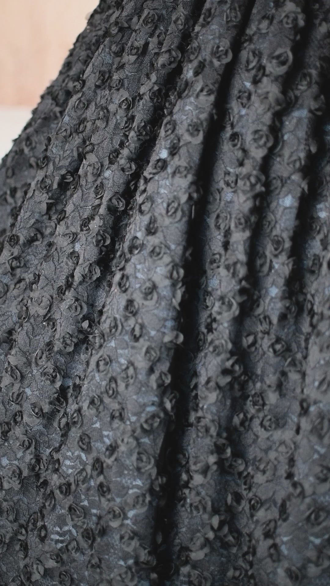 Stunning couture gown for girls featuring butterflies and a voluminous floral-textured skirt.
