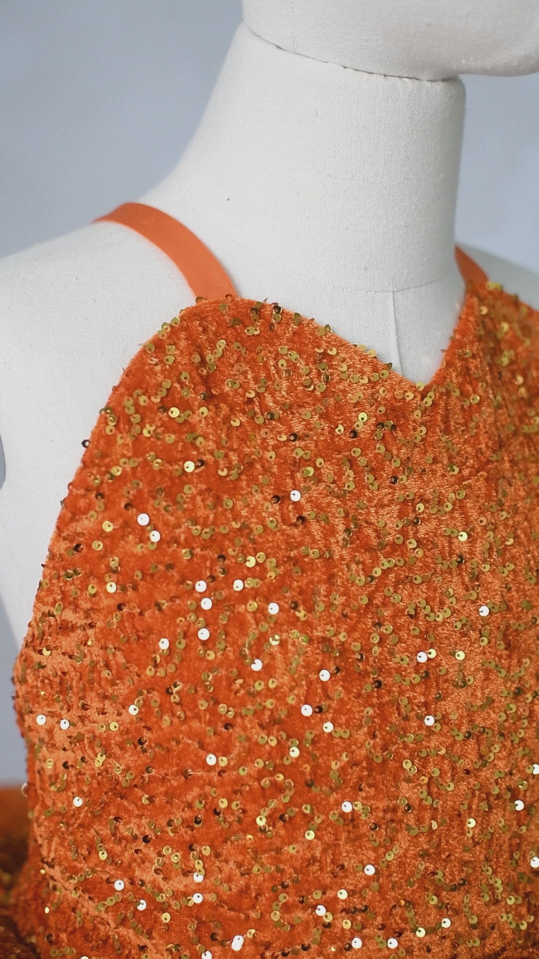 Couture orange sequin gown for Swiftie-themed birthday photoshoot or concert event.