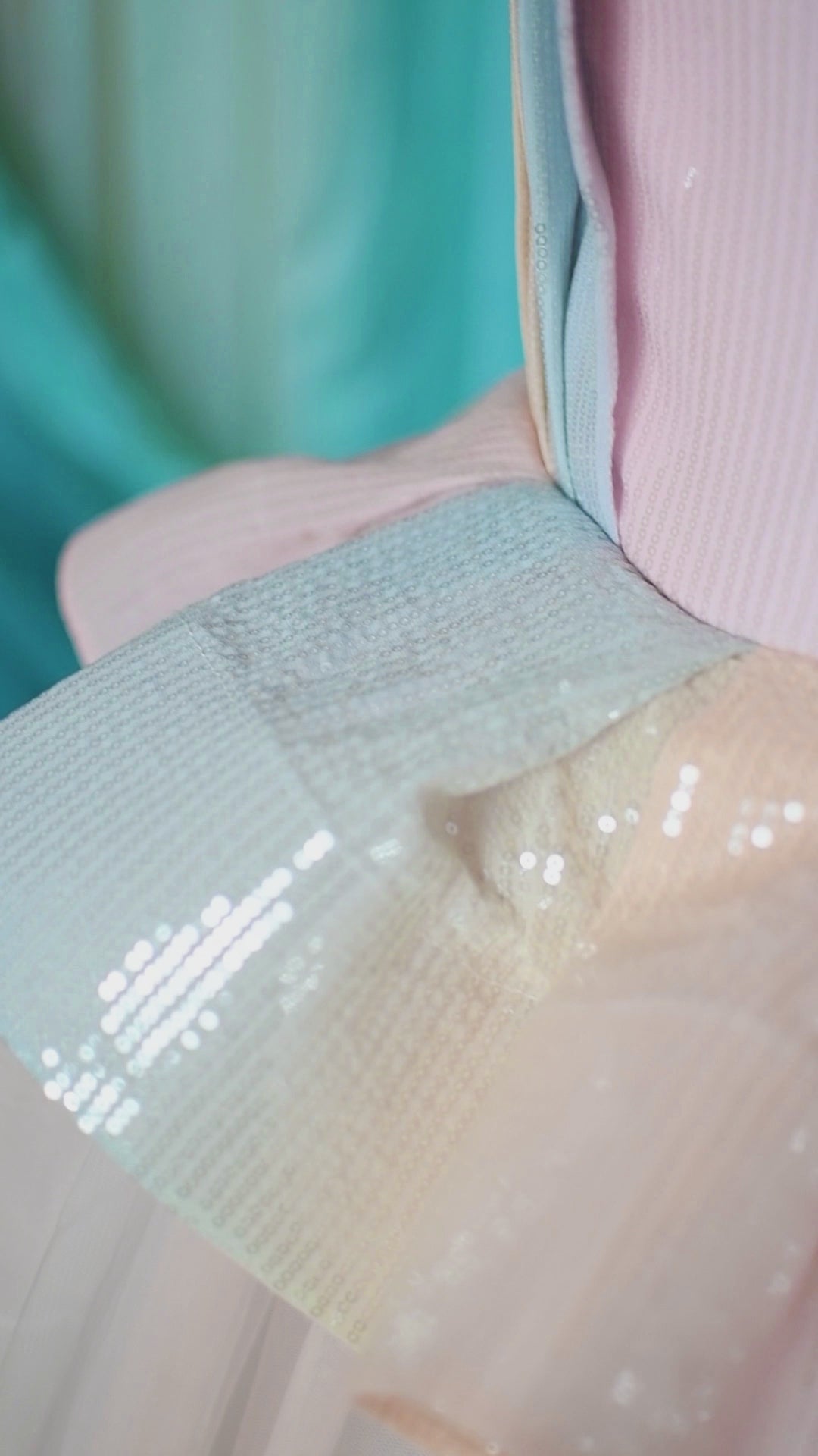 Soft, bridal tulle skirt of Prism of Dreams gown in ombre pastel shades with sequin details.