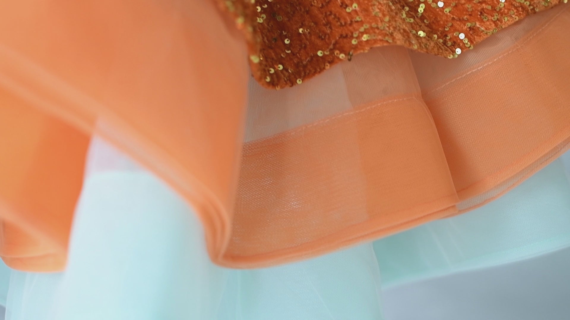 Couture orange sequin gown for Swiftie-themed birthday photoshoot or concert event.