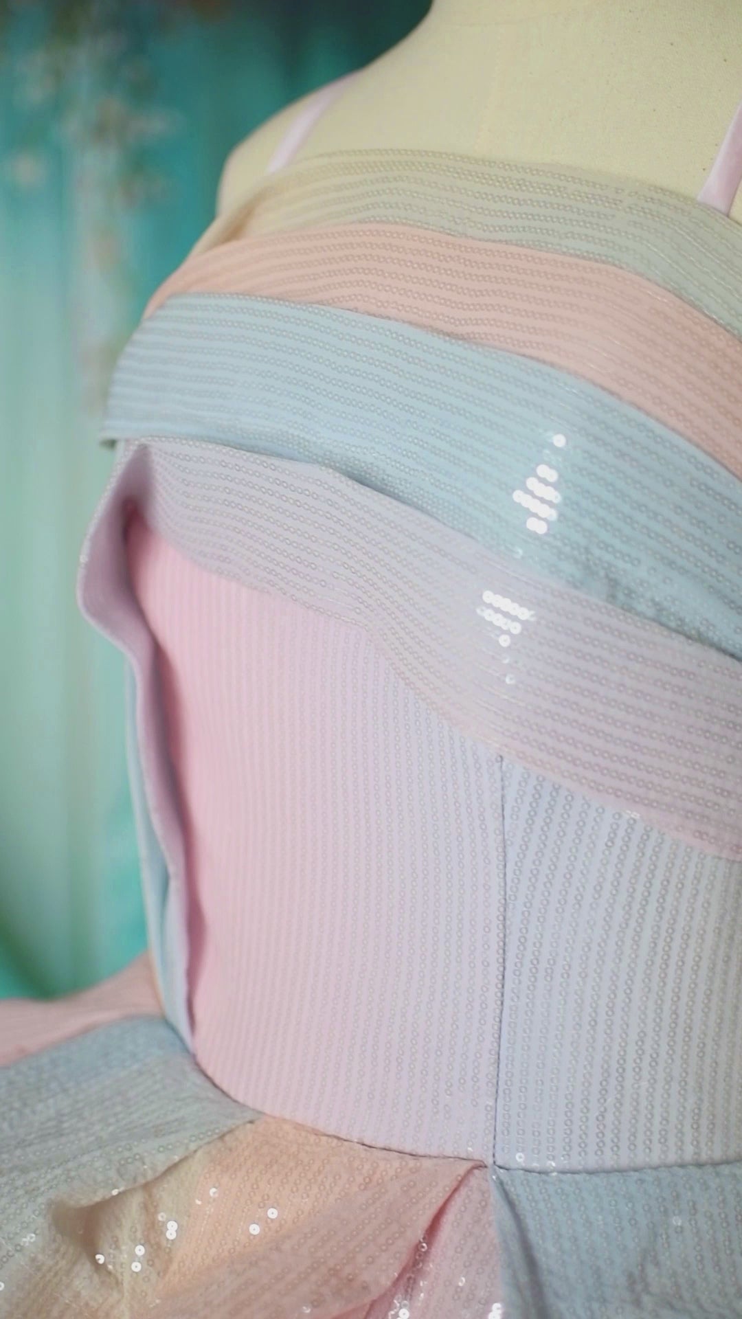 Elegant ombre pastel tulle skirt of Prism of Dreams gown with ruffled pleat bodice.