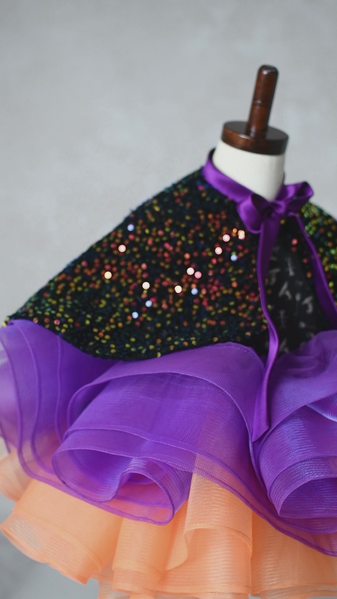 "Luxury children’s Halloween outfit with spooky couture styling and pumpkins"