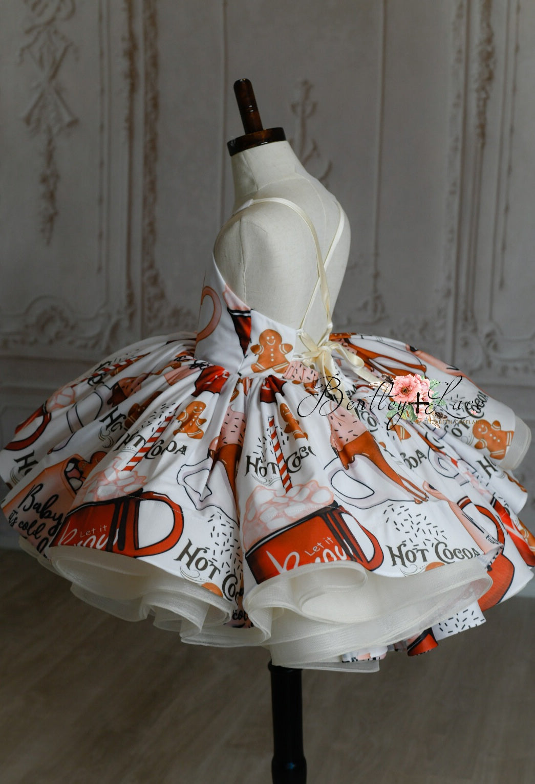Twirl-worthy holiday dress with warm brown and red tones
