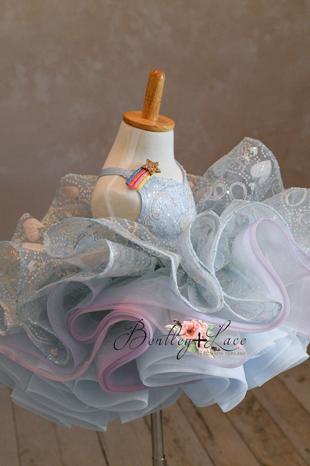 Comfortable and dreamy rainbow party dress with sequin detailing and soft lining.
